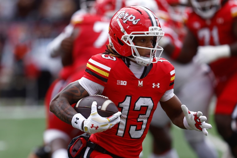 Maryland wide receiver Chris Durr Jr. (13) runs the football during an NCAA football game against Rutgers on Saturday, Oct. 17, 2026 in College Park, Md. (AP Photo/Mike Buscher)