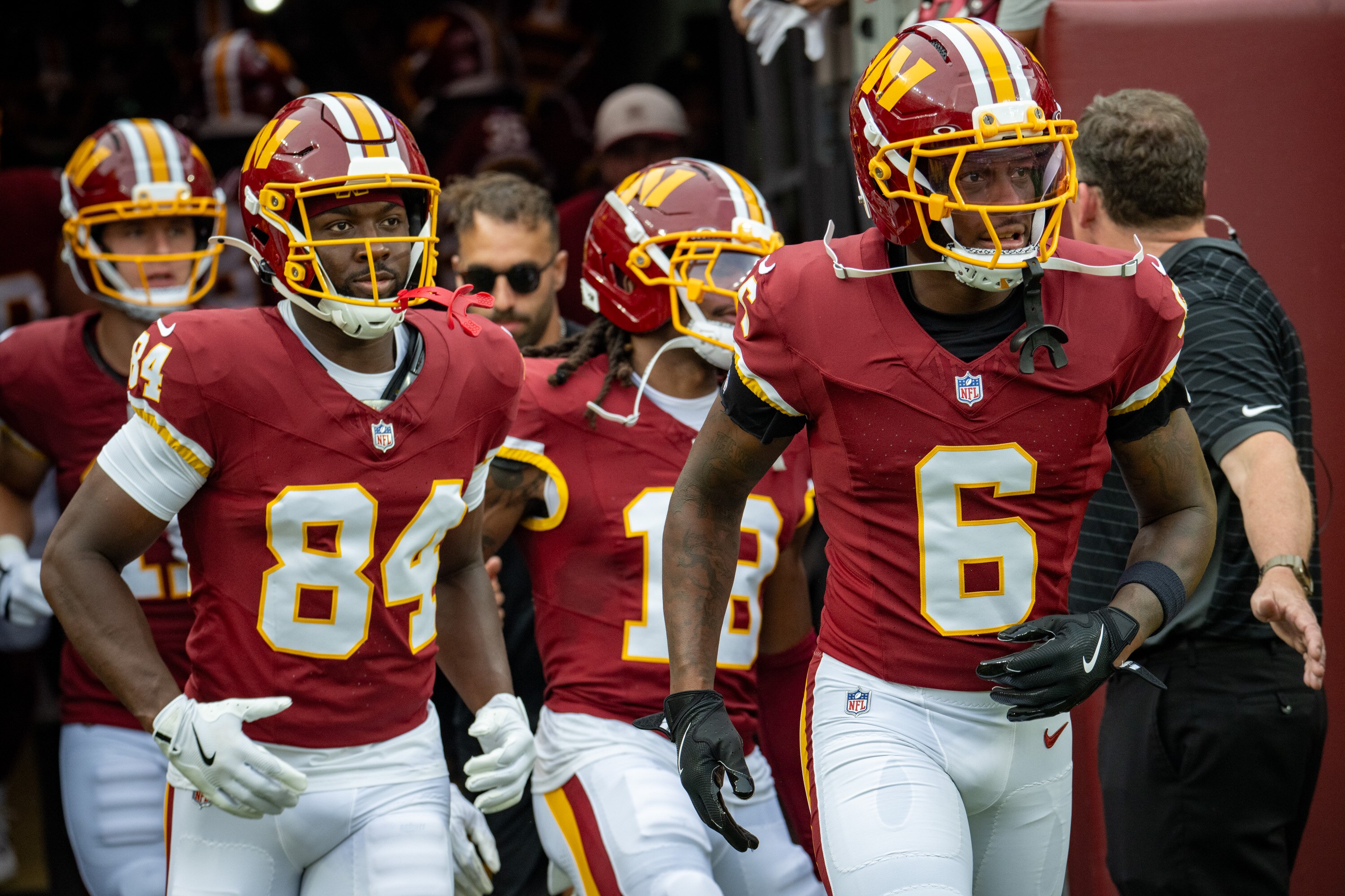 The Washington Commanders take the field for warmups as the Commanders prepare to host the Miami Dolphins in Landover last month.