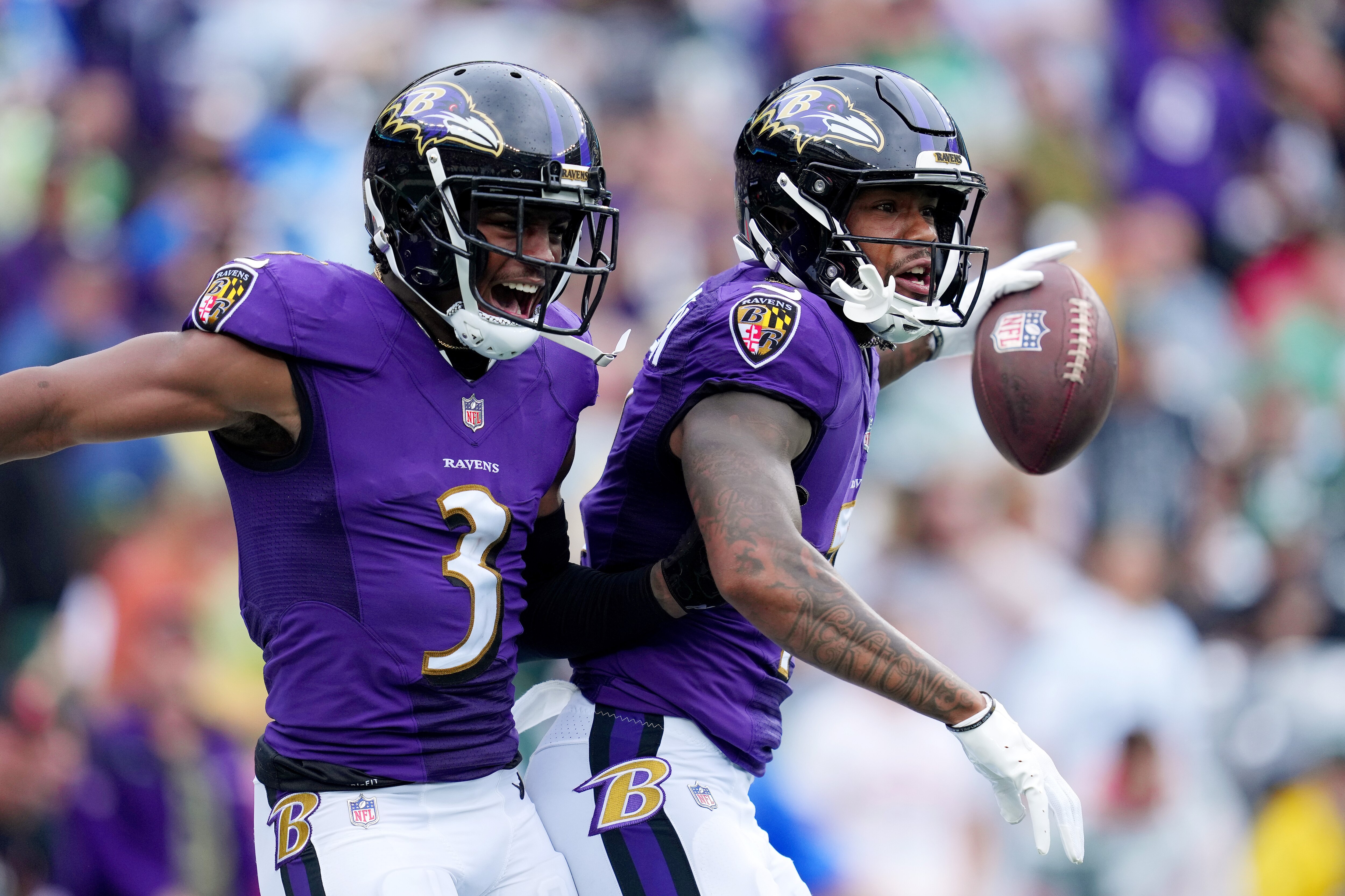 Rashod Bateman #7 of the Baltimore Ravens celebrates with James Proche II #3 after scoring a touchdown during the third quarter against the New York Jets at MetLife Stadium on September 11, 2022 in East Rutherford, New Jersey.