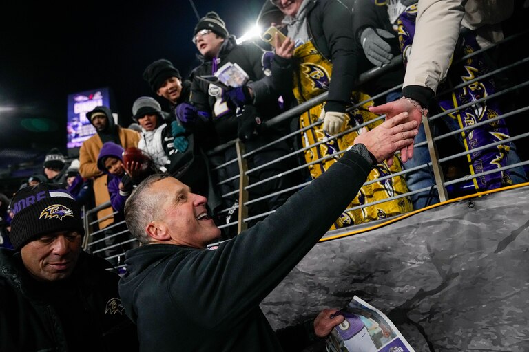 Baltimore Ravens head coach John Harbaugh shakes hands with fans after winning a game against the Cleveland Browns at M&T Bank Stadium in Baltimore, Md. on Saturday, January 4, 2025.