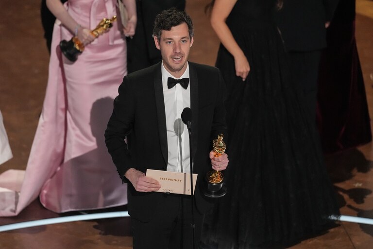 Alex Coco accepts the award for best picture for "Anora."