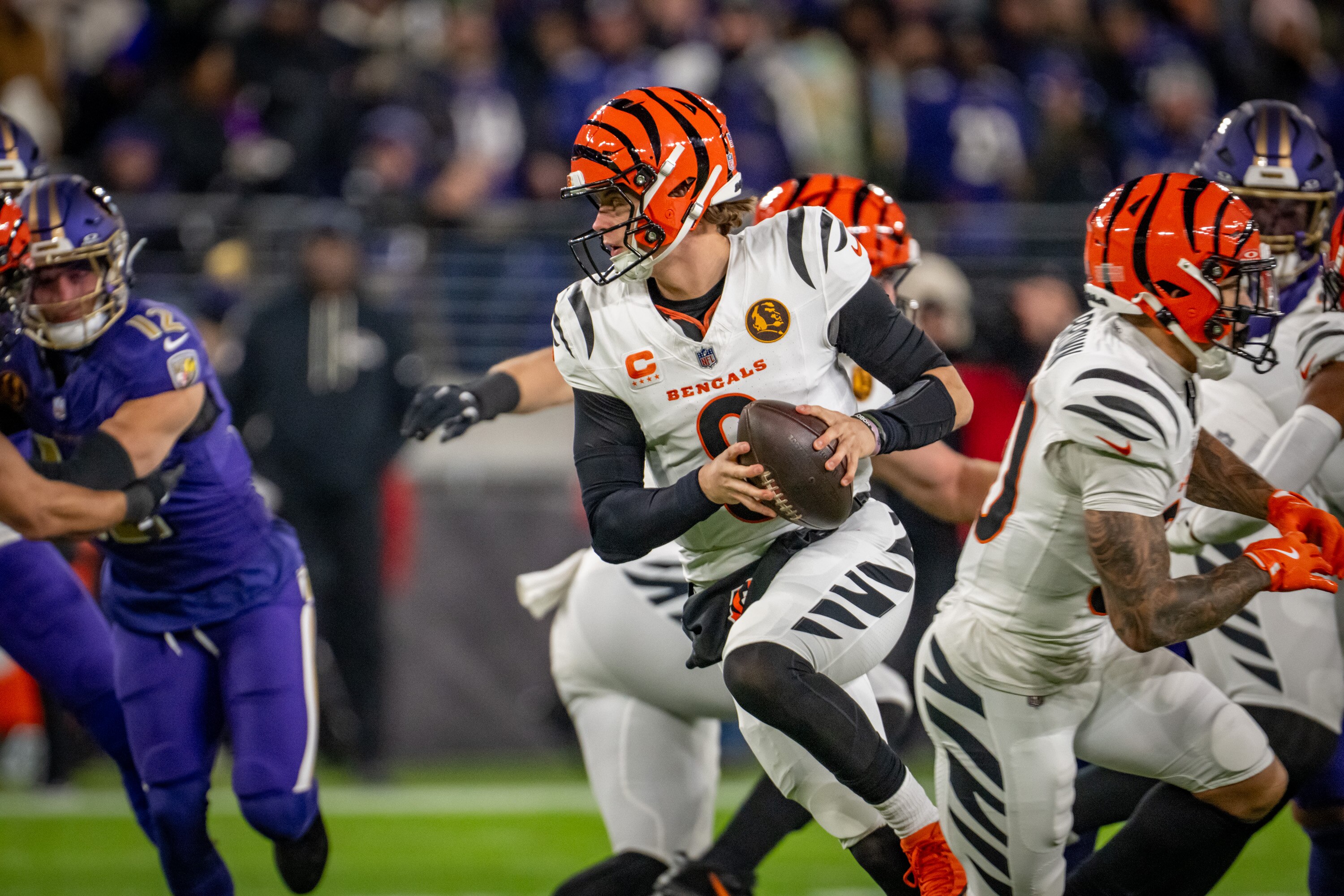 Bengals quarterback Joe Burrow rolls out of the pocket in the first quarter of Cincinnati’s win at Baltimore on Nov. 27.