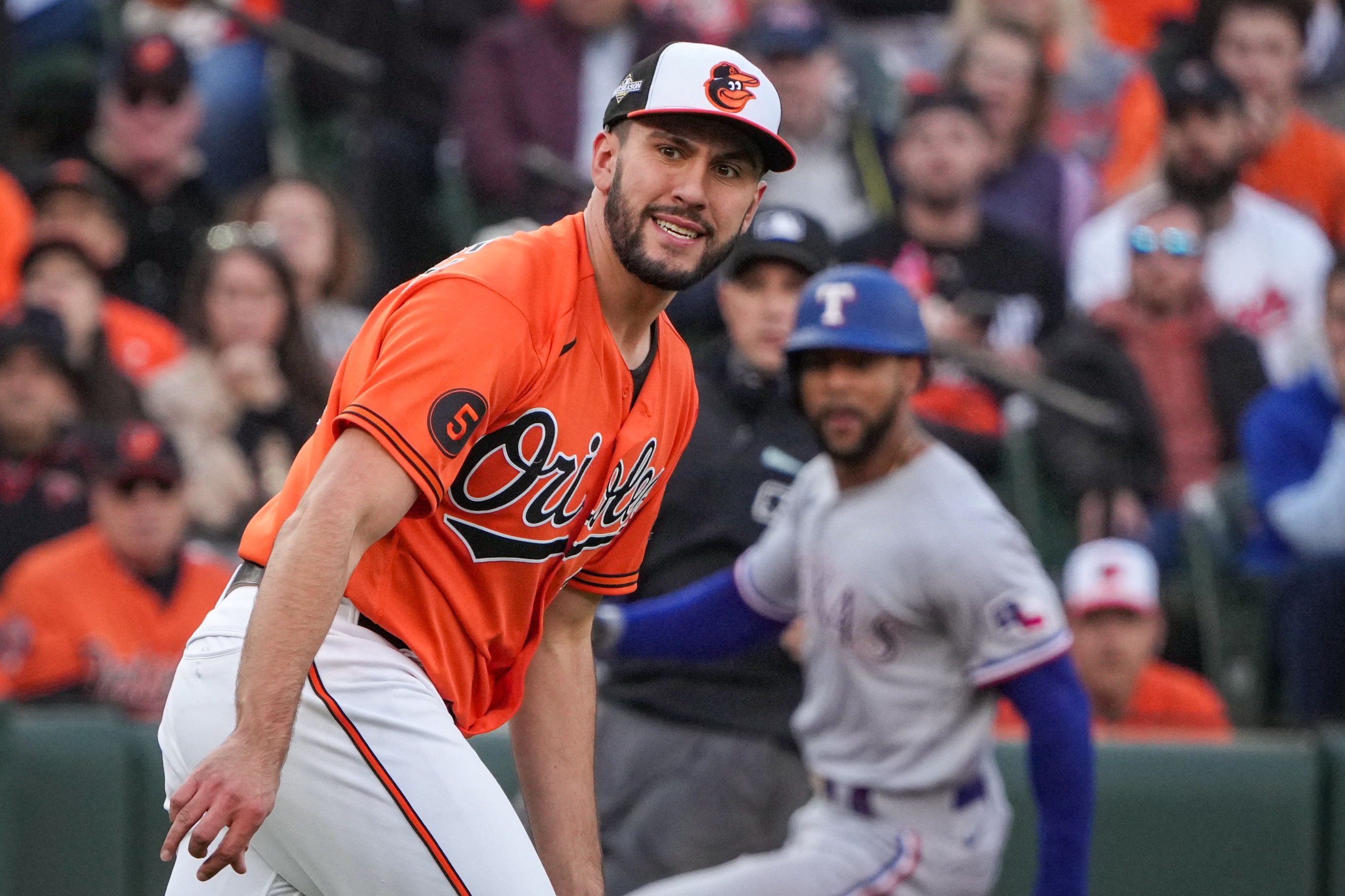 Baltimore Orioles starting pitcher Grayson Rodriguez reacts after one of the Texas Rangers connects with his pitch during Game 2 of the American League Divisional Series at Camden Yards on Sunday, Oct. 8, 2023.