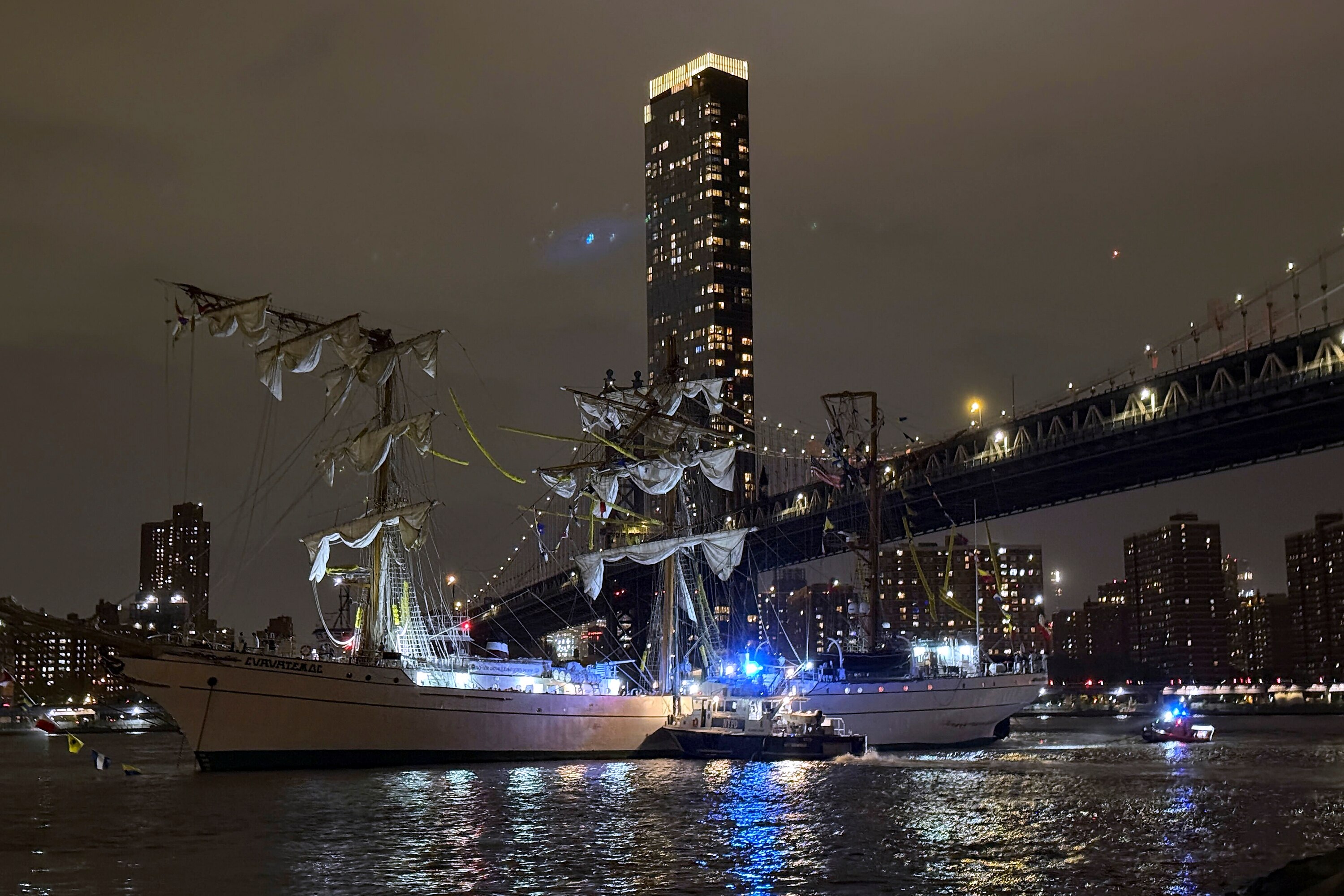 A masted Mexican Navy training ship, the Cuauhtémoc, sits stranded after colliding with the Brooklyn Bridge after, Saturday, May 17, 2025, in New York.