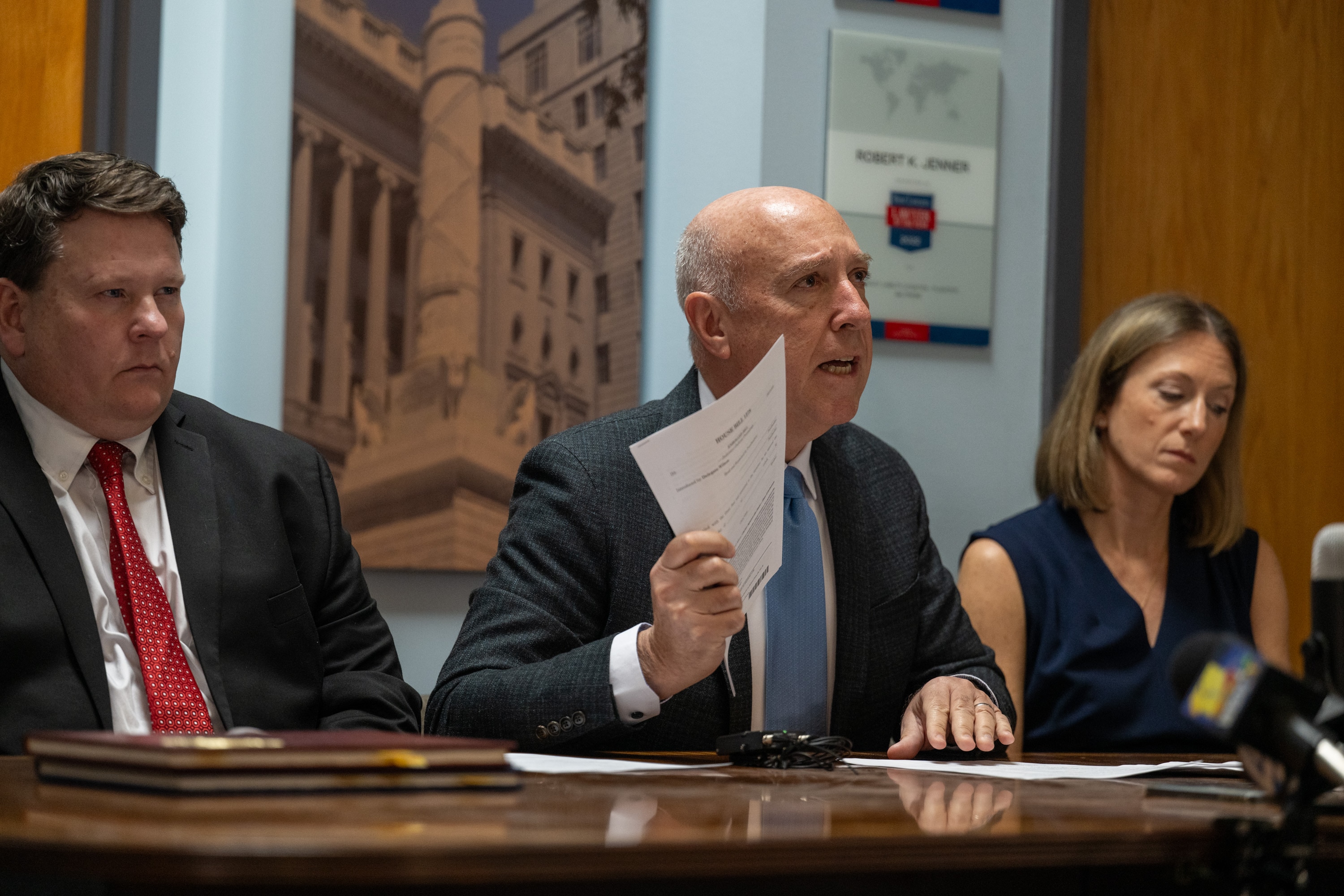 Attorney Robert Jenner, center, called on Gov. Wes Moore to veto legislation that would slash what survivors of childhood sexual abuse can win in civil court cases in Maryland.