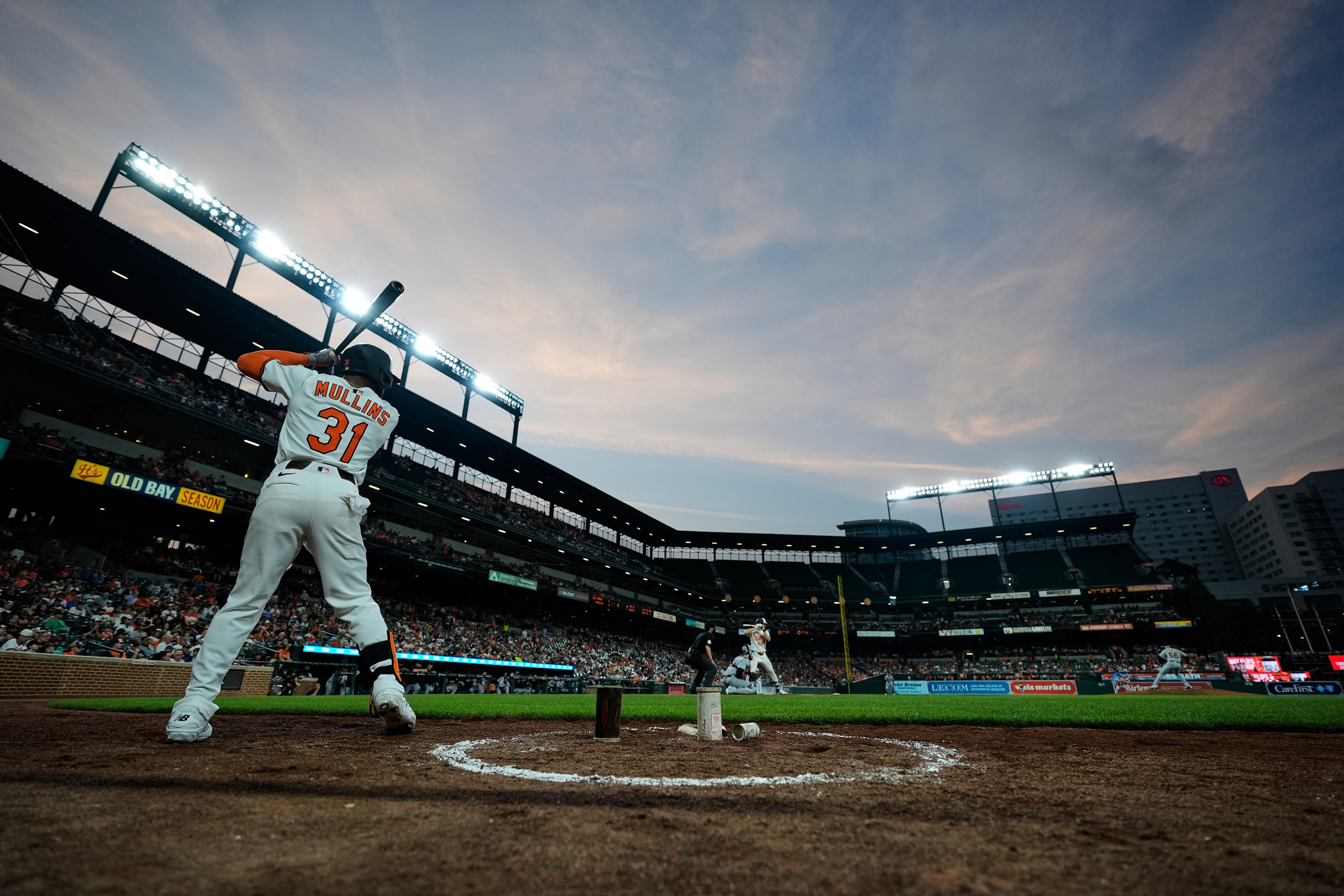 Baltimore Orioles' Cedric Mullins (31) practices swings while on deck during the seventh inning of a baseball game against the Detroit Tigers, Tuesday, June 10, 2025, in Baltimore.