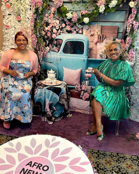 Catrina Colleen Henry Parham, left, and Carla Henry Hopkins at a past AFRO Tea.