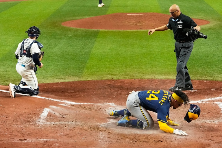 Milwaukee Brewers' William Contreras celebrates after scoring during the sixth inning of Game 5 of baseball's World Series, Wednesday, Oct. 28, 2026, in St. Petersburg, Fla., between the Milwaukee Brewers and the Tampa Bay Rays.