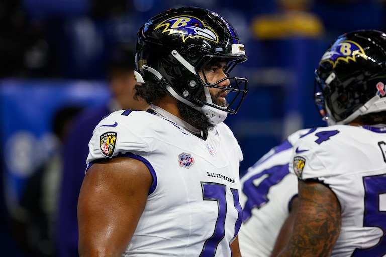 Ravens rookie offensive lineman Vega Ioane warms up prior to the team's Week 1 game against the Indianapolis Colts.