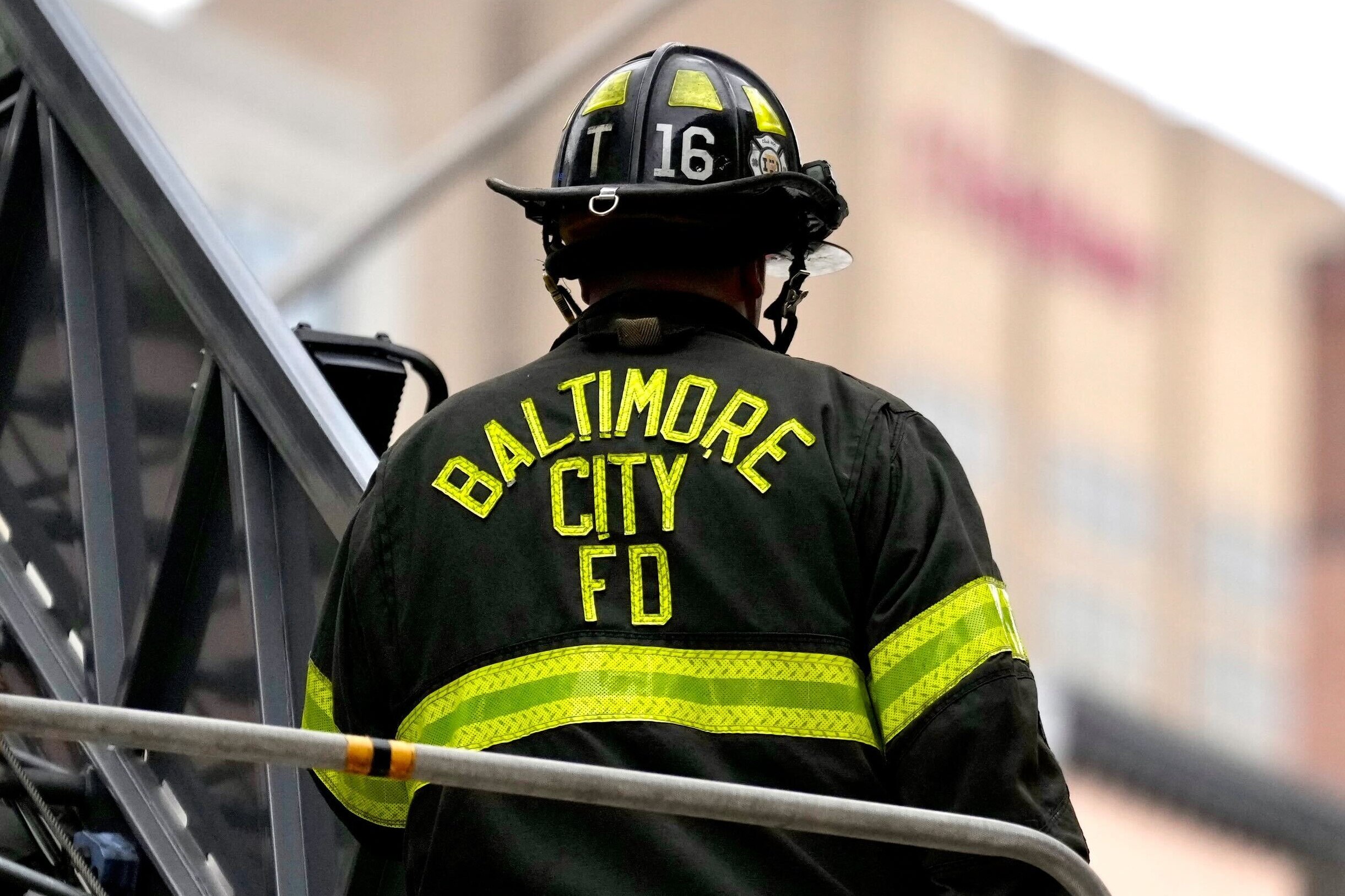 A Baltimore City firefighter on the scene of a fire in Downtown Baltimore on Sept. 22, 2024.
