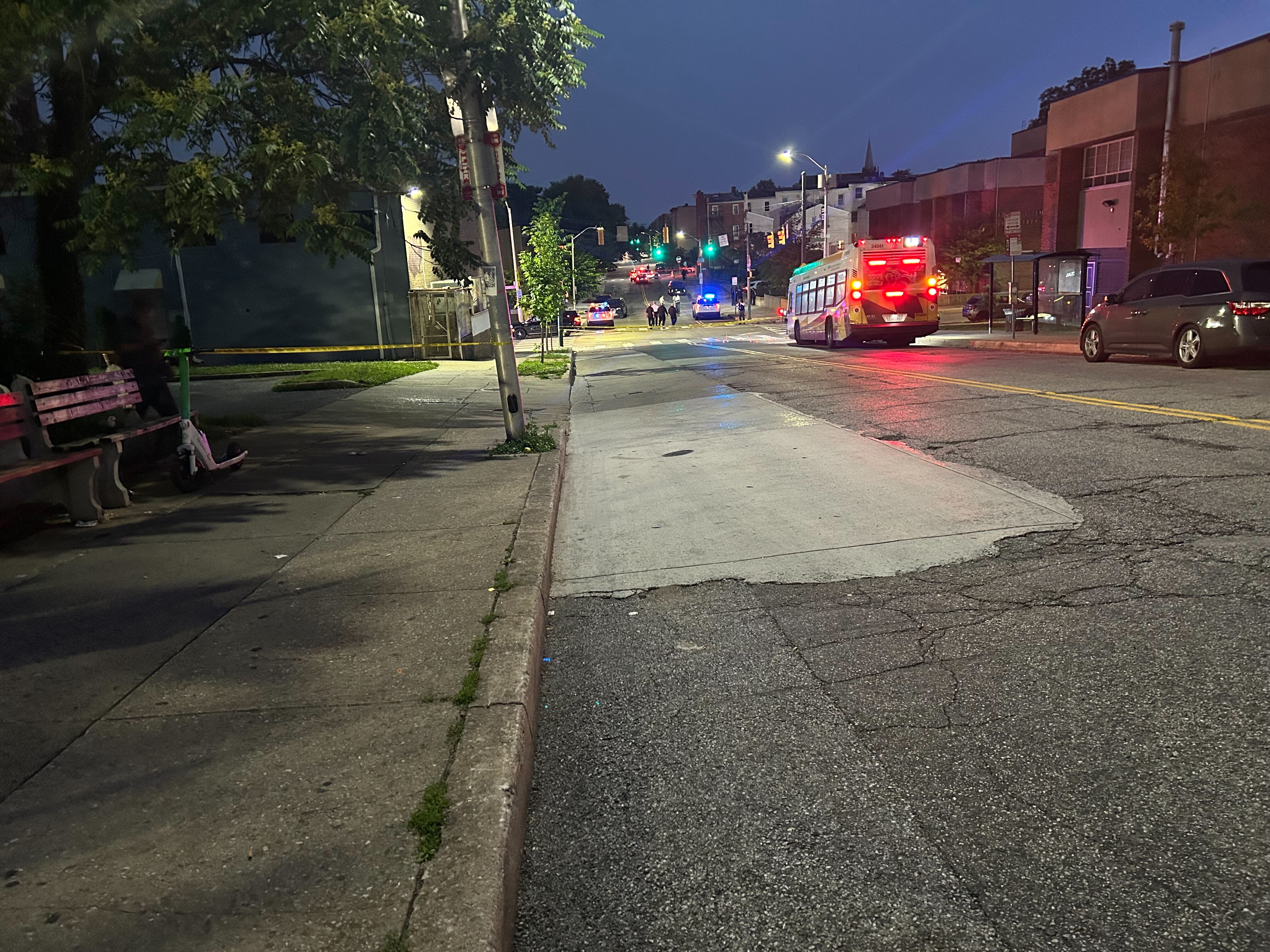 Baltimore Police blocked off the area between the McCulloh Homes and Furman L. Templeton Elementary School with yellow tape and littered the corner of Pennsylvania Avenue and Dolphin Street near the Robert C. Marshall Recreation Center with over a dozen orange evidence cones on Wednesday, May 27, 2026.