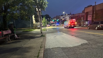 Baltimore Police blocked off the area between the McCulloh Homes and Furman L. Templeton Elementary School with yellow tape and littered the corner of Pennsylvania Avenue and Dolphin Street near the Robert C. Marshall Recreation Center with over a dozen orange evidence cones on Wednesday, May 27, 2026.