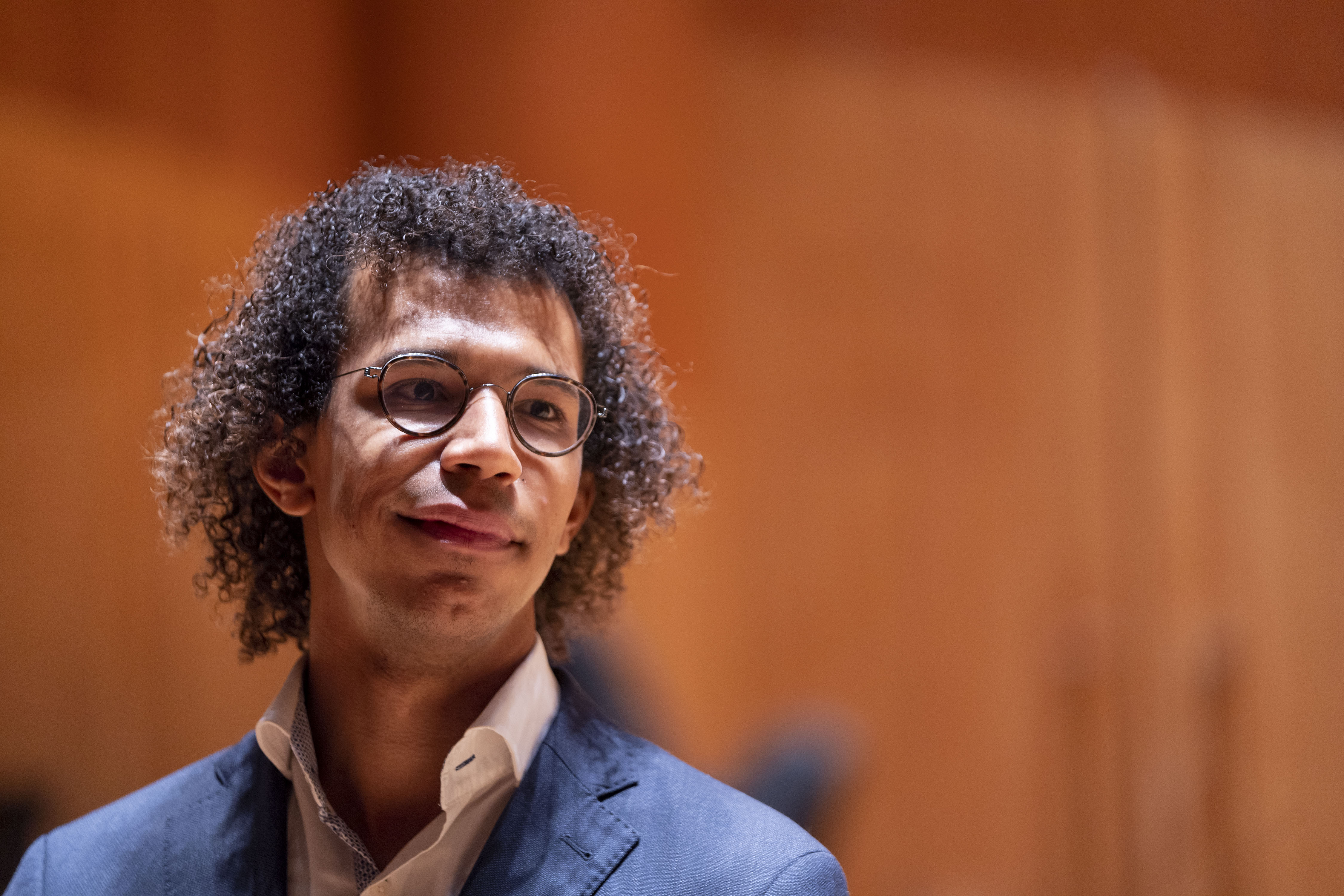 Jonathon Hayward speaks with reporters in the Meyerhoff Symphony Hall.