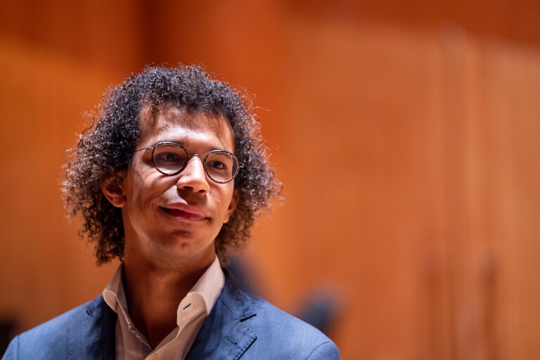 Jonathon Hayward speaks with reporters in the Meyerhoff Symphony Hall.