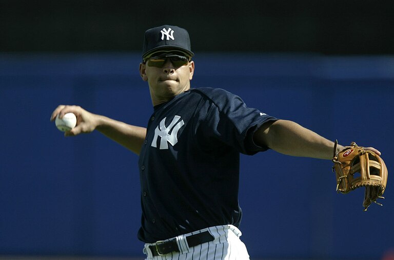 Former New York Yankees third baseman Alex Rodriguez throws during spring training in 2004.