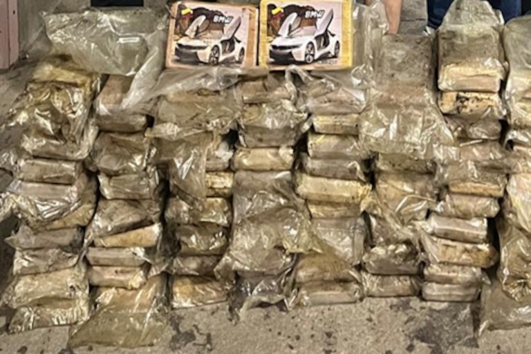 Approximately 83 kg of suspected cocaine seized from a concealed location within a flatbed truck, discovered during a traffic stop.