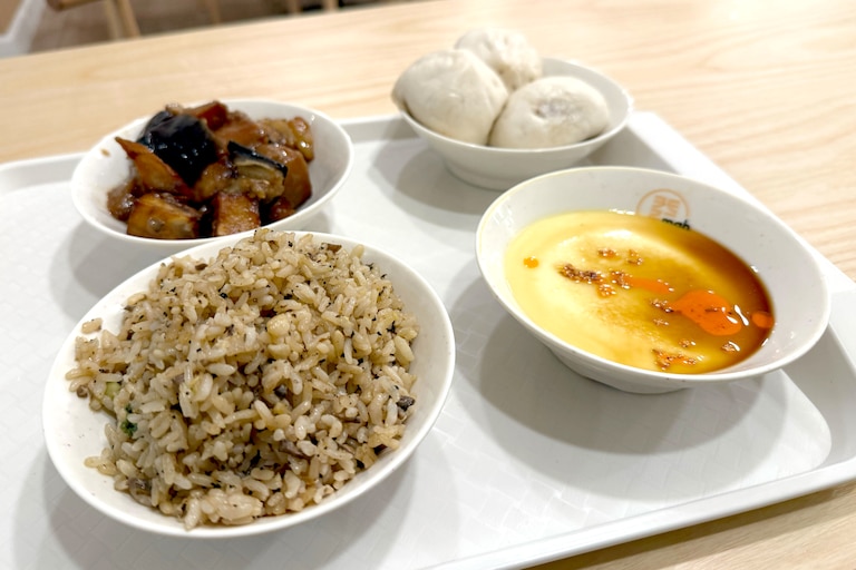 Truffle rice, steamed egg, eggplant and dumplings from Mahjong in Charles Village.