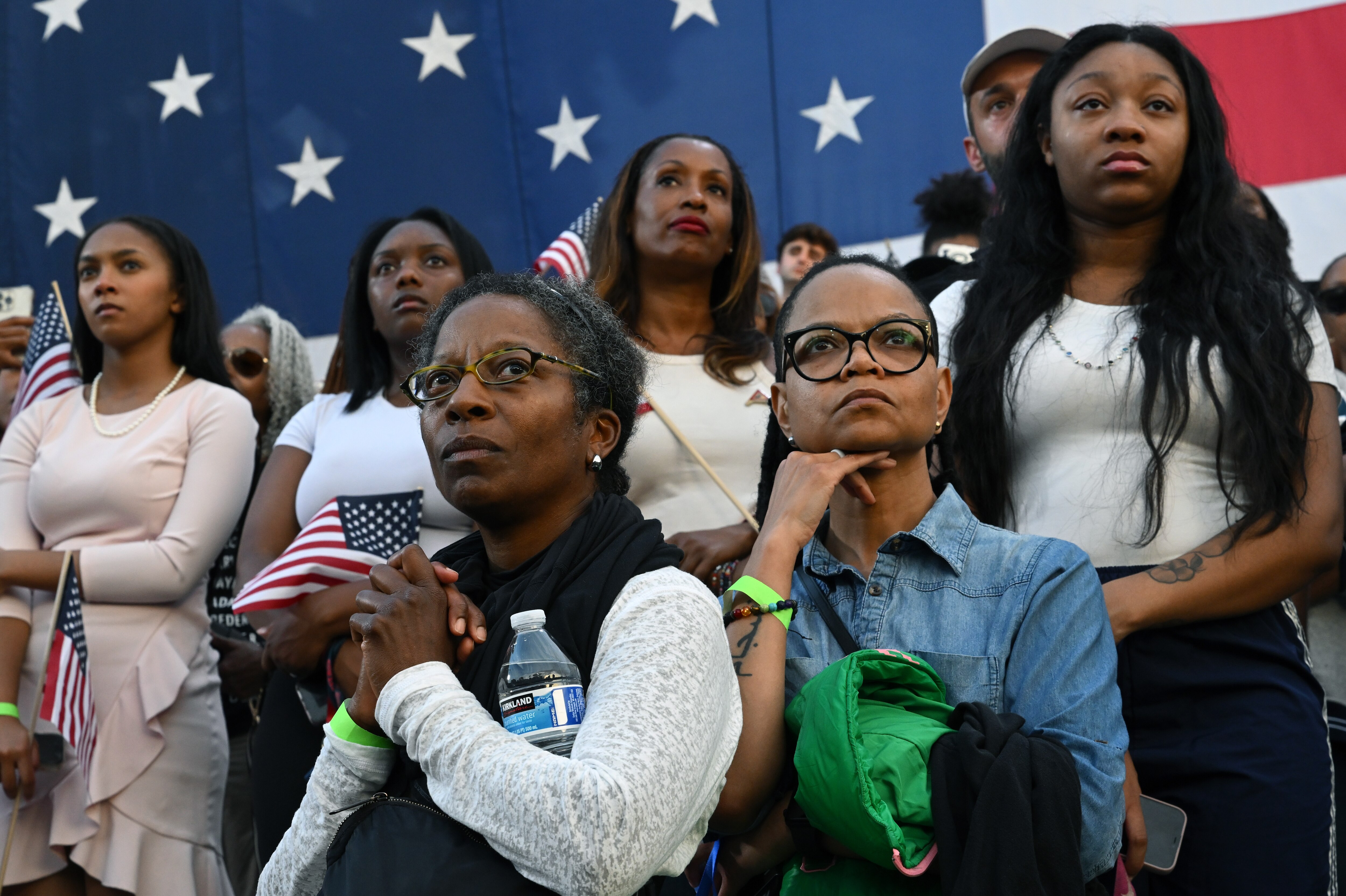 Supporters listen as Vice President Kamala Harris concedes the election Wednesday during a speech at Howard University in Washington, D.C.