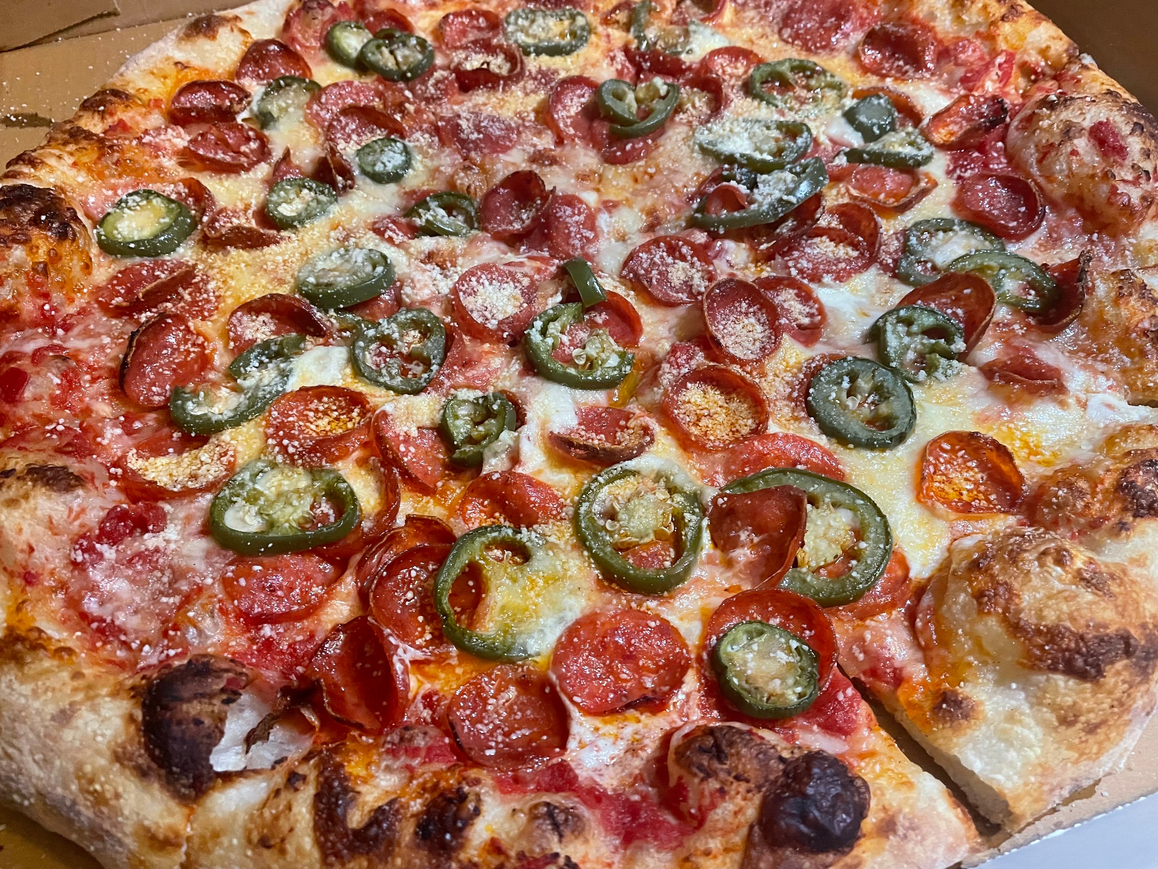 The spicy pepperoni pizza at Baltoz Bakery & Cafe, a new arrival to 6709 York Road. Owner Vlado Petrovski resists categorization, saying “My pizza is my pizza.”