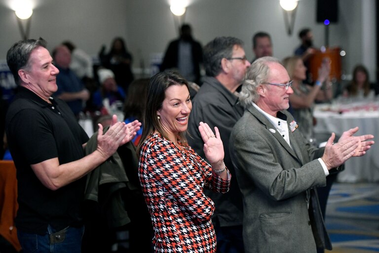 Gordana Schifanelli, center, Maryland's Republican candidate for lieutenant governor, who ran with Republican gubernatorial candidate Dan Cox, not pictured, waves during a campaign results reception, Tuesday, Nov. 8, 2022, in Annapolis, Md.