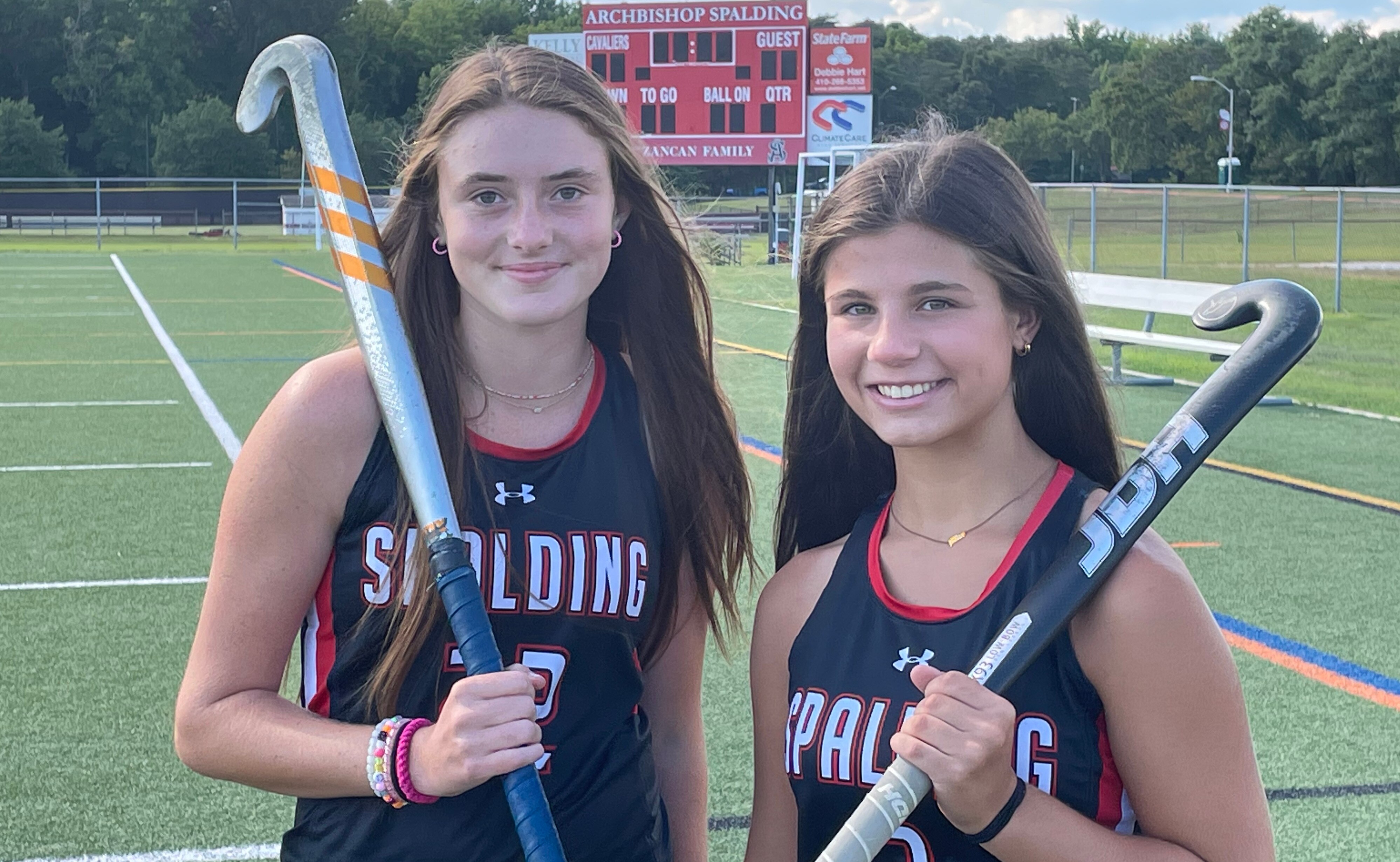Archbishop Spalding sophomores Stella Bumgarner (left) and Jilly Lawn carry on family legacies of field hockey, following their sisters and their mothers into the sport. Their sisters -- Shelby Bumgarner, Margot Lawn and Becca Lawn -- all played at Spalding while their moms Jenny Bumgarner and Teri Lawn played at Elkton and Woodlawn respectively. Teri Lawn's mother played on the US national team.