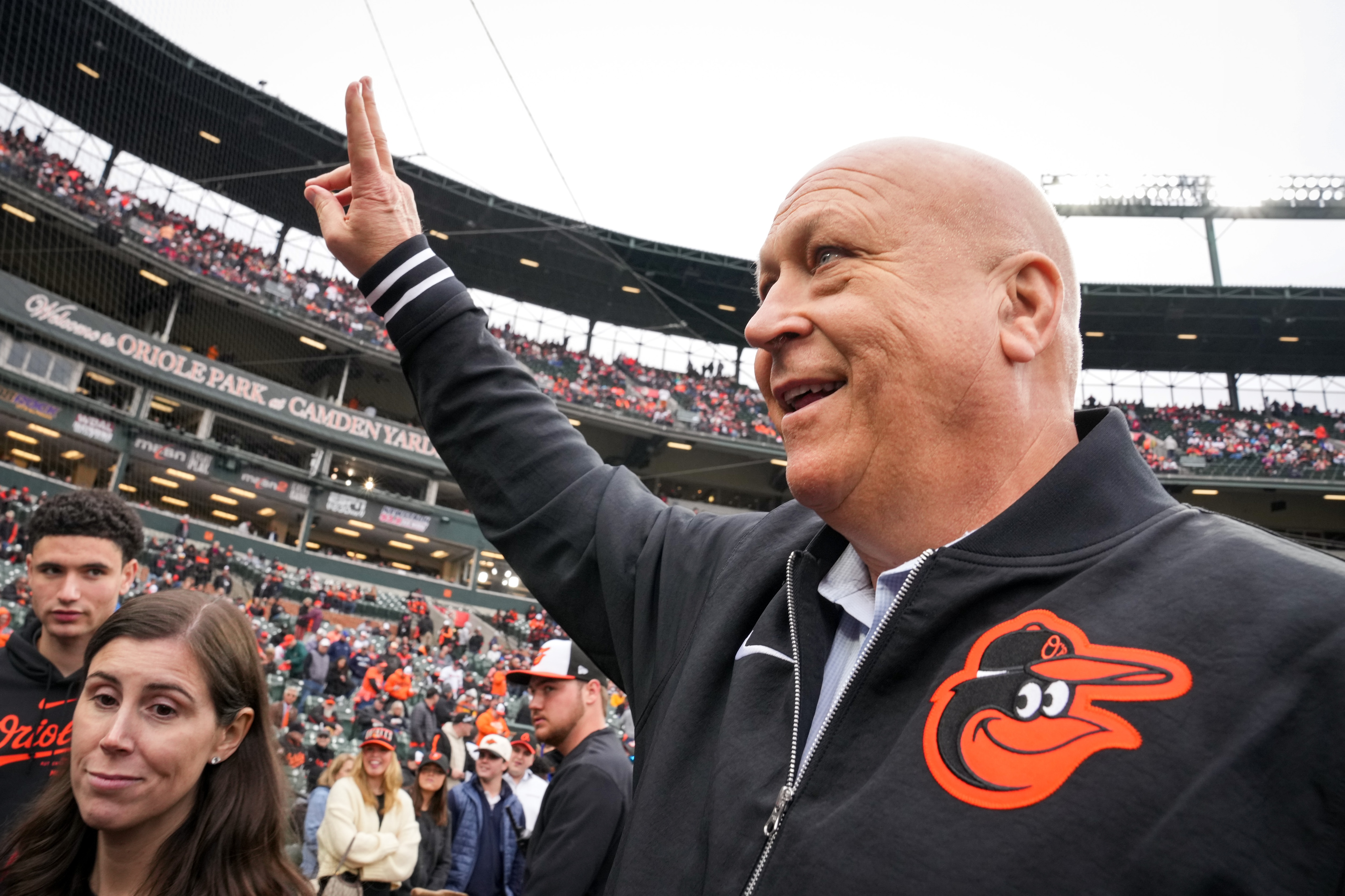 Baltimore Orioles legend and Hall of Famer Cal Ripken Jr. waves to the crowd at Camden Yards on Thursday, March 28, 2024. The Baltimore Orioles won their first game of the season, 11-3, against the Angels.