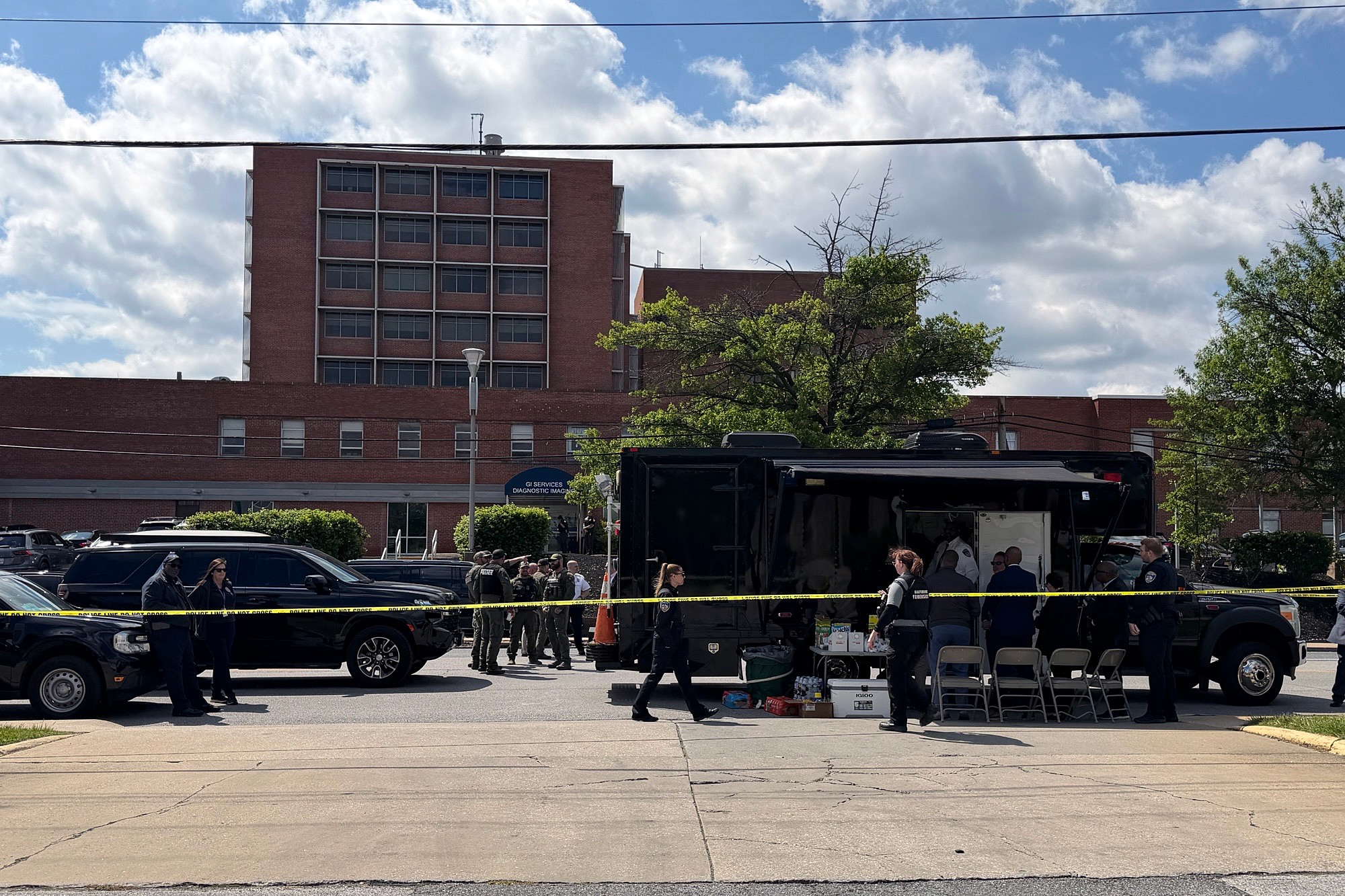 Thursday, May 14, 2026 - Baltimore Police and forensics at the scene of a police shooting near the intersection of Wilkens and South Caton avenues on Thursday.