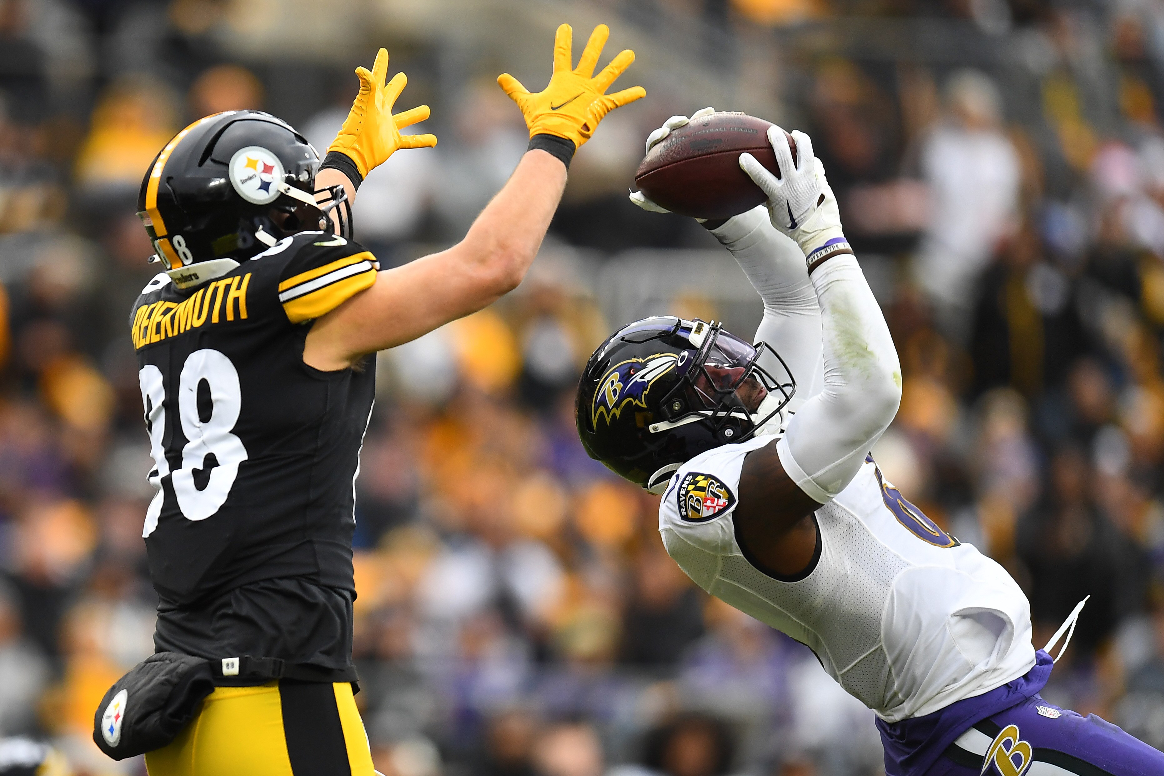 PITTSBURGH, PENNSYLVANIA - DECEMBER 11: Patrick Queen #6 of the Baltimore Ravens intercepts the pass intended for Pat Freiermuth #88 of the Pittsburgh Steelers in the second quarter of the game at Acrisure Stadium on December 11, 2022 in Pittsburgh, Pennsylvania. (Photo by Joe Sargent/Getty Images)