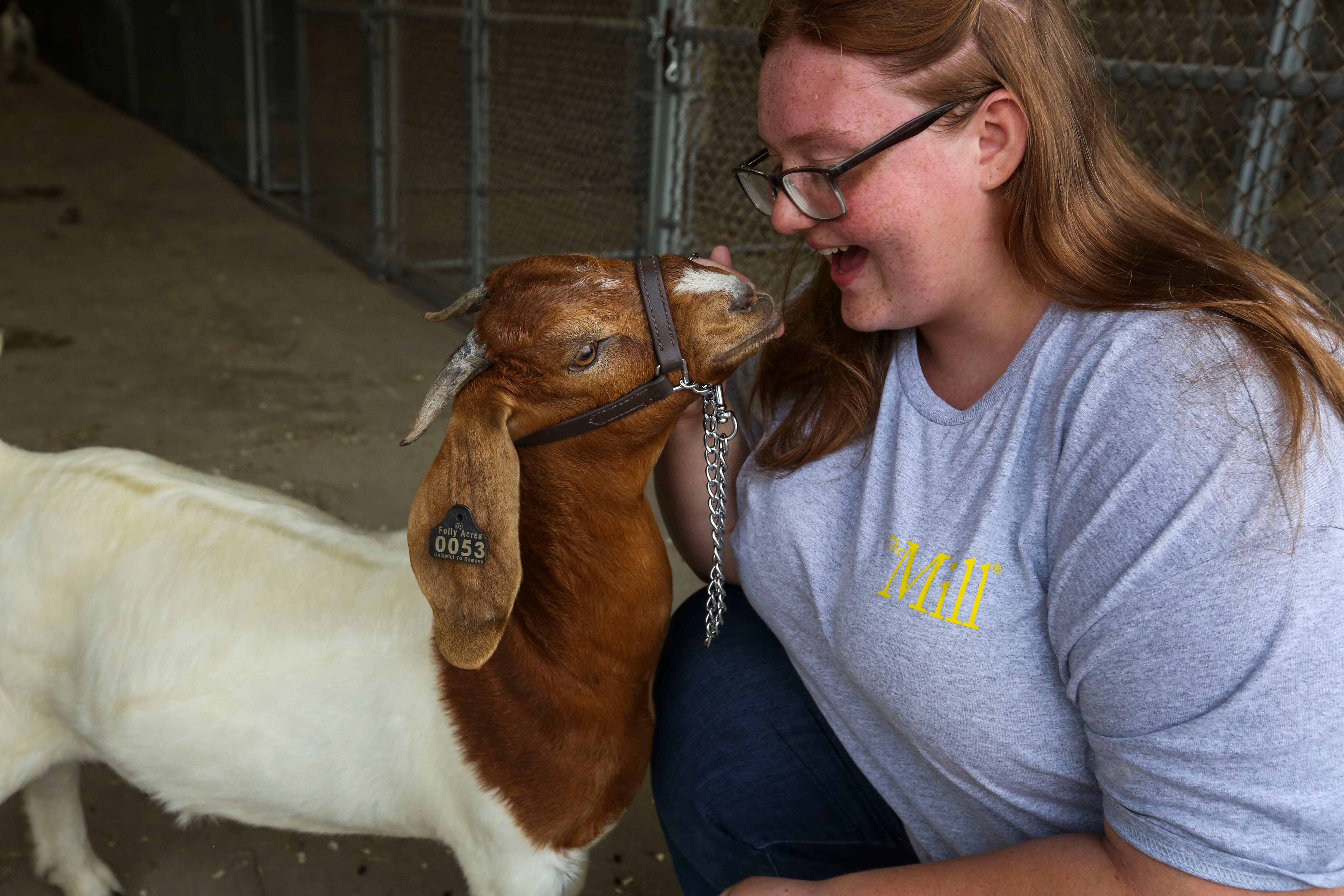 Alivia Blum shows off her goat, Miss Kitty, at the Maryland State Fair in Timonium, MD on August 25, 2022.
