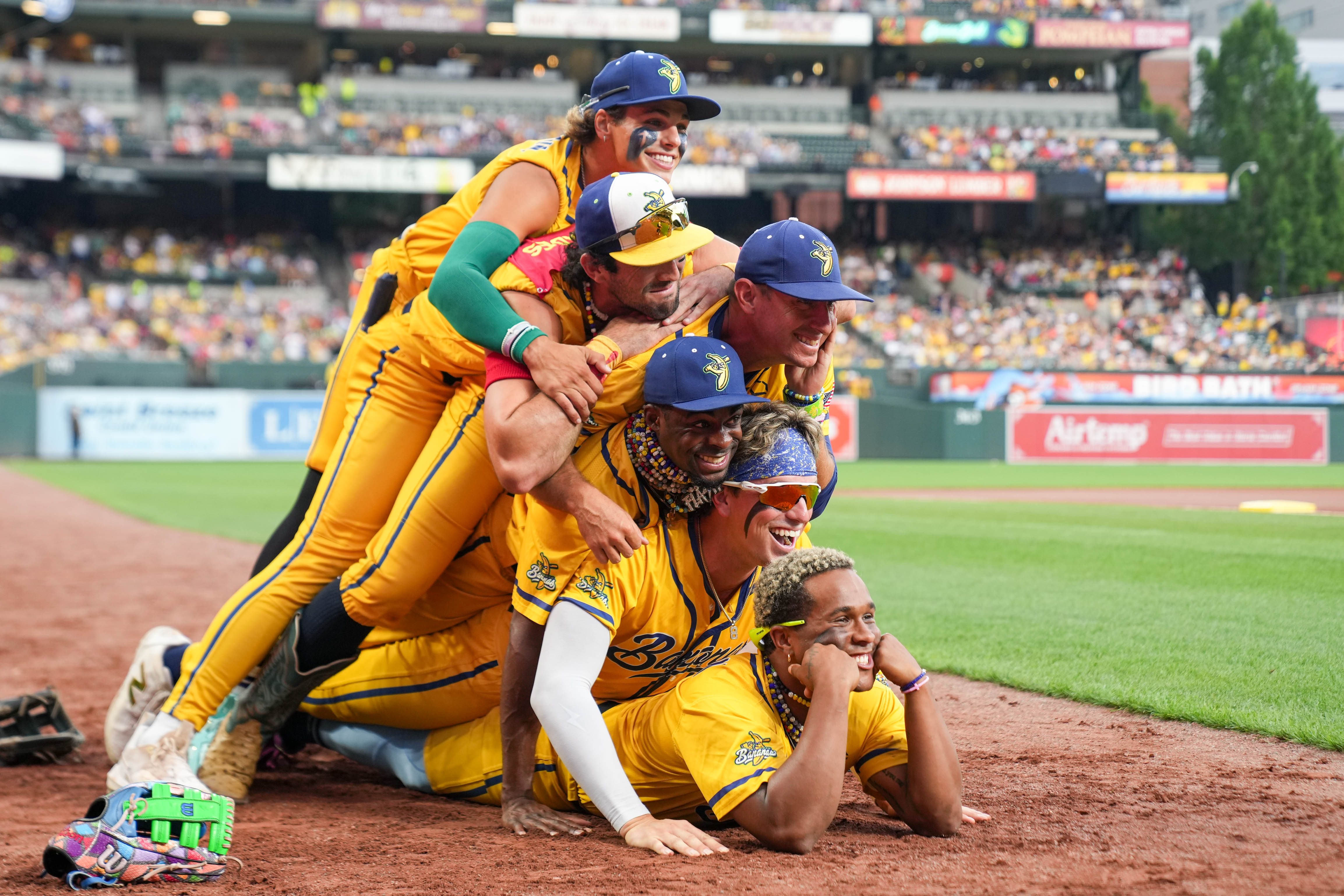 Members of the Savannah Bananas pose for a photo ahead of Friday’s game against The Firefighters at Camden Yards.
