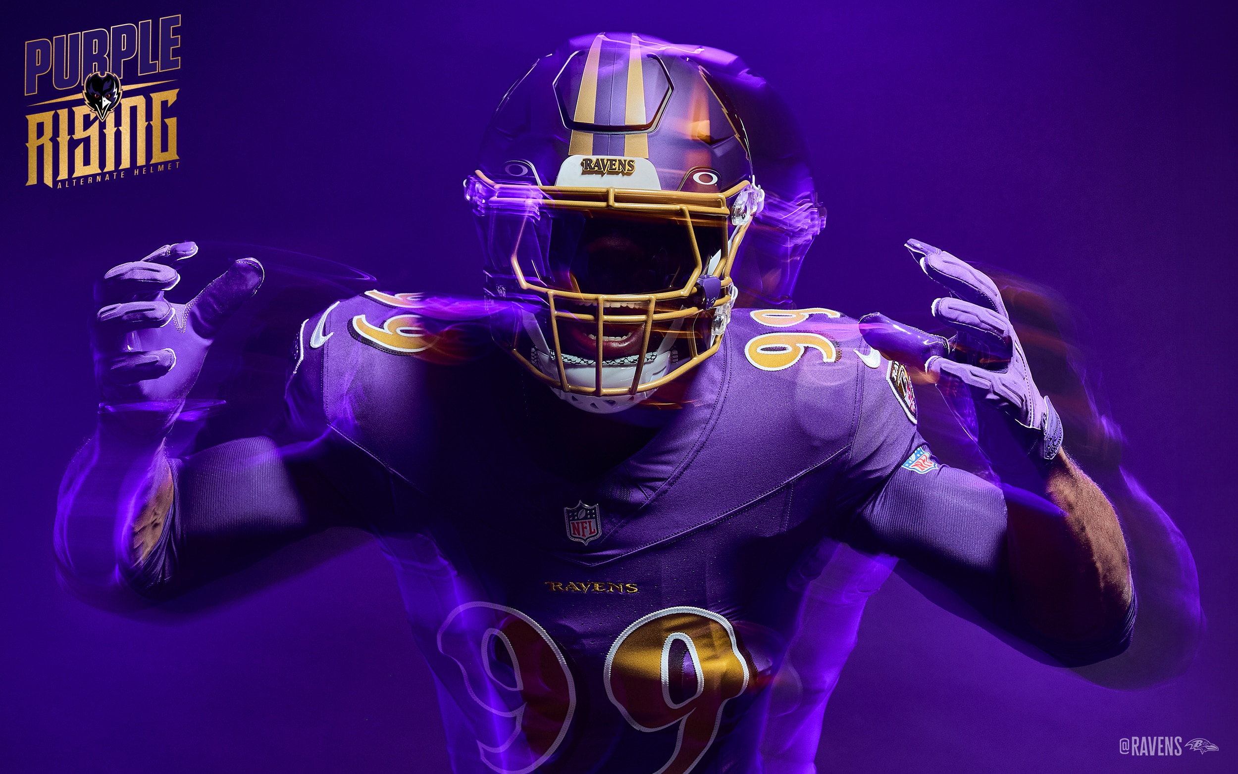 Ravens outside linebacker Odafe Oweh models the new Purple Rising alternate helmet.