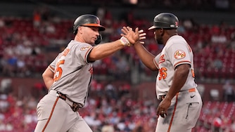 Baltimore Orioles' Pete Alonso, left, is congratulated by first base coach Jason Bourgeois after hitting a three-run home run during the third inning against the St. Louis Cardinals on Tuesday.