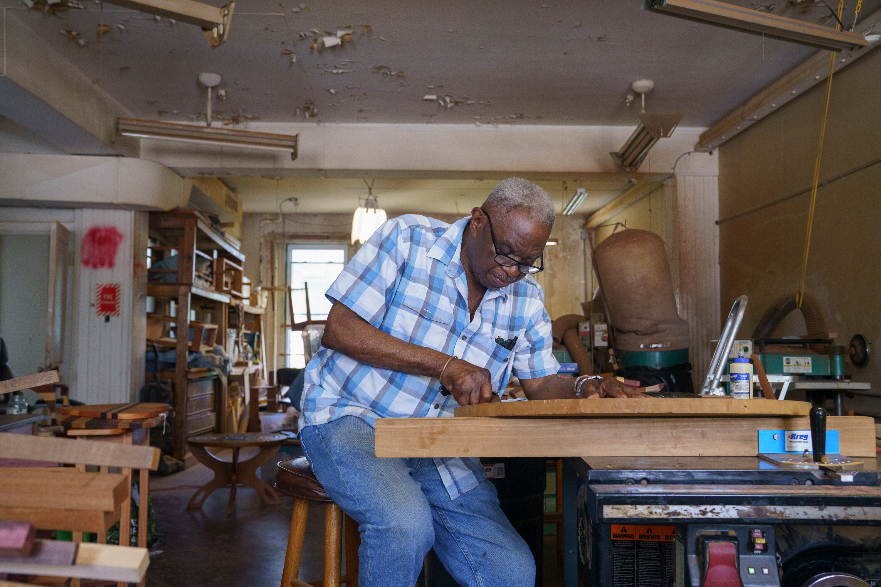 Adiante Franszoon works on an ongoing piece in his workshop in Baltimore City.