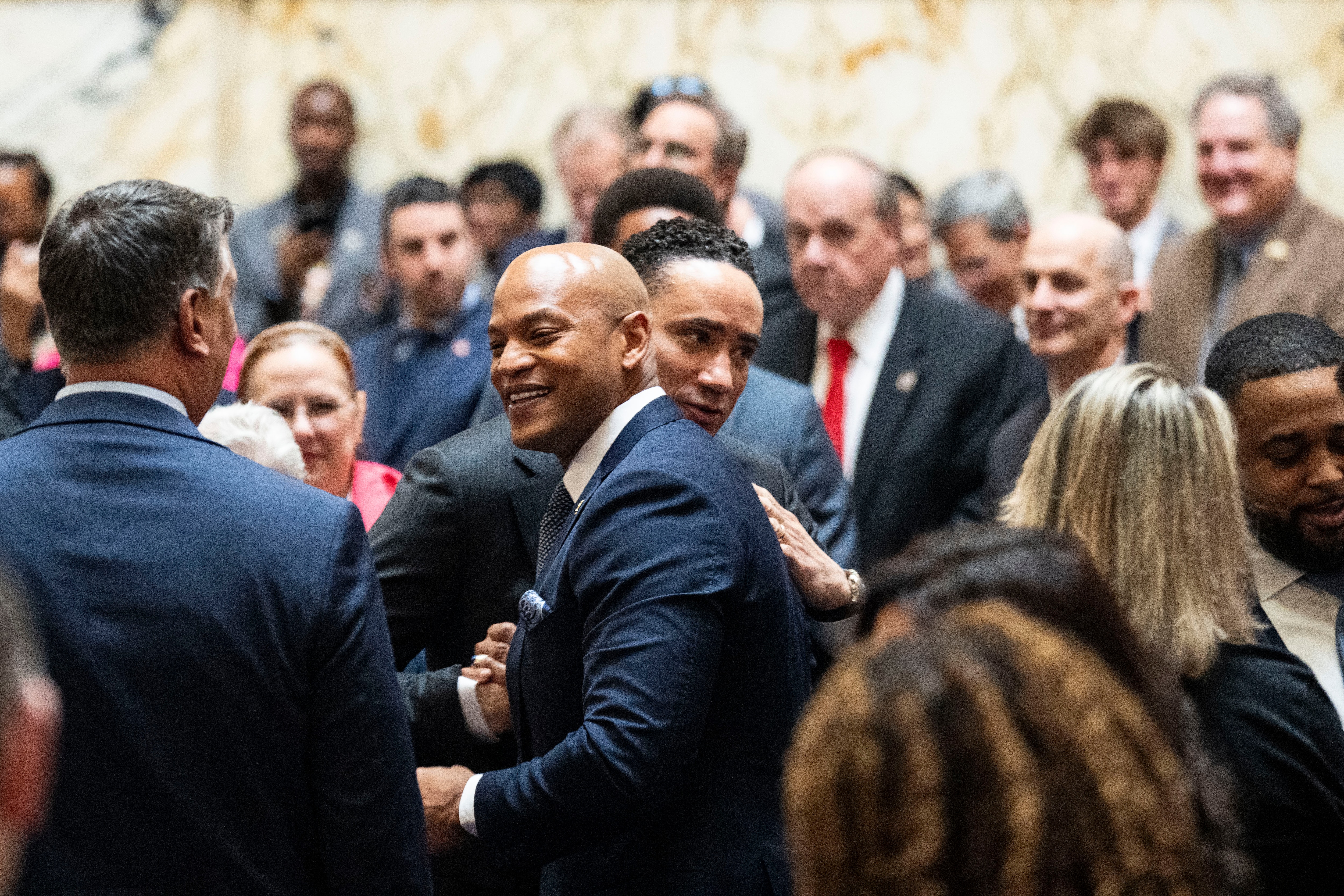 Gov. Wes Moore is greeted by legislators ahead of his annual State of the State address in February.