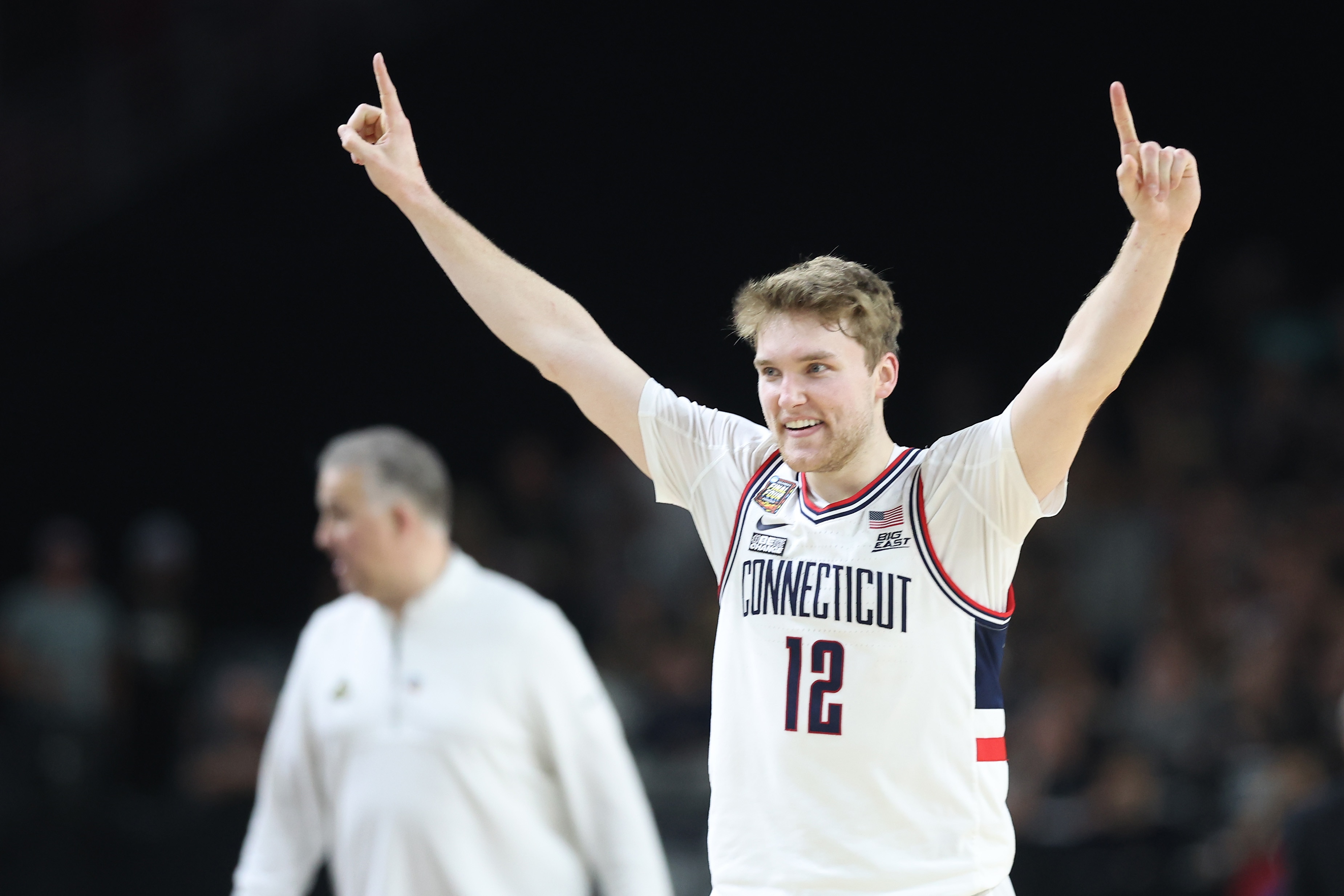 Cam Spencer of the Connecticut Huskies celebrates after beating the Purdue Boilermakers 75-60 to win the NCAA Men’s Basketball Tournament National Championship. Spencer played at Boys’ Latin and Loyola University.
