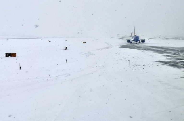 Snow covers the tarmac at the Baltimore/Washington International Thurgood Marshall Airport (BWI) on Monday, January 6, 2025.