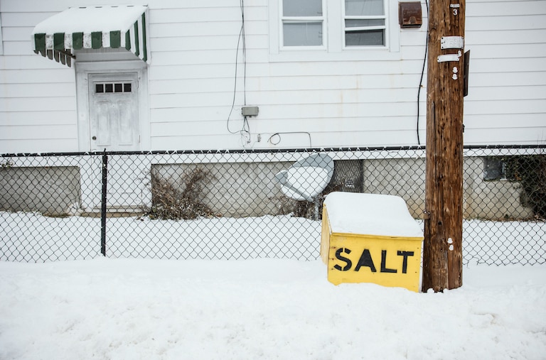 BALTIMORE, MD - JAN 6, 2025: Salt box seen on a snowy day in Hoes Heights neighborhood in Baltimore on January 6, 2025.