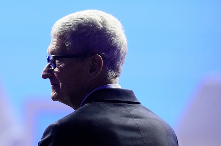 Apple CEO Tim Cook waits for the arrival of President Donald Trump during the Annual Meeting of the World Economic Forum in Davos, Switzerland, Wednesday, Jan. 21, 2026.