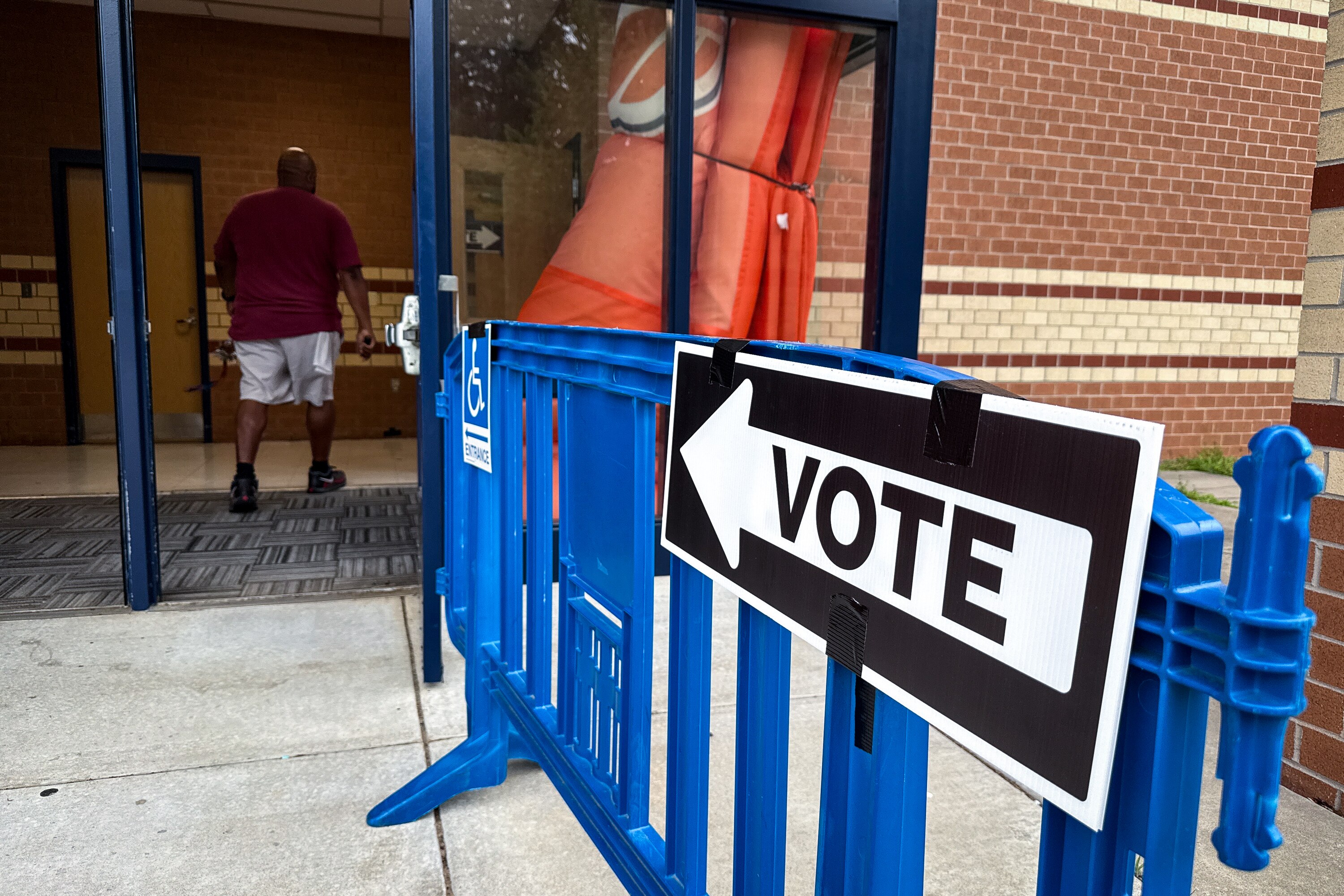 People head into vote in the primary election at Reservoir High School in Fulton as polls open on Tuesday morning.