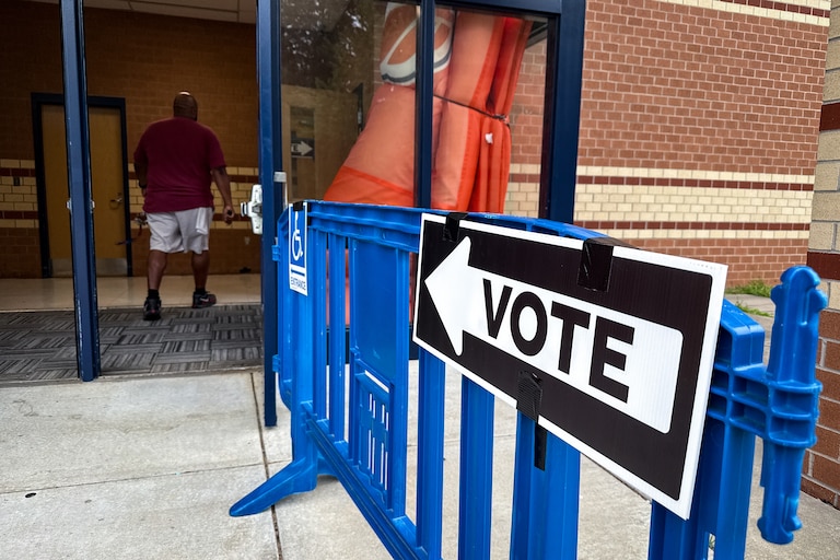 People head into vote in the primary election at Reservoir High School in Fulton as polls open on Tuesday morning.