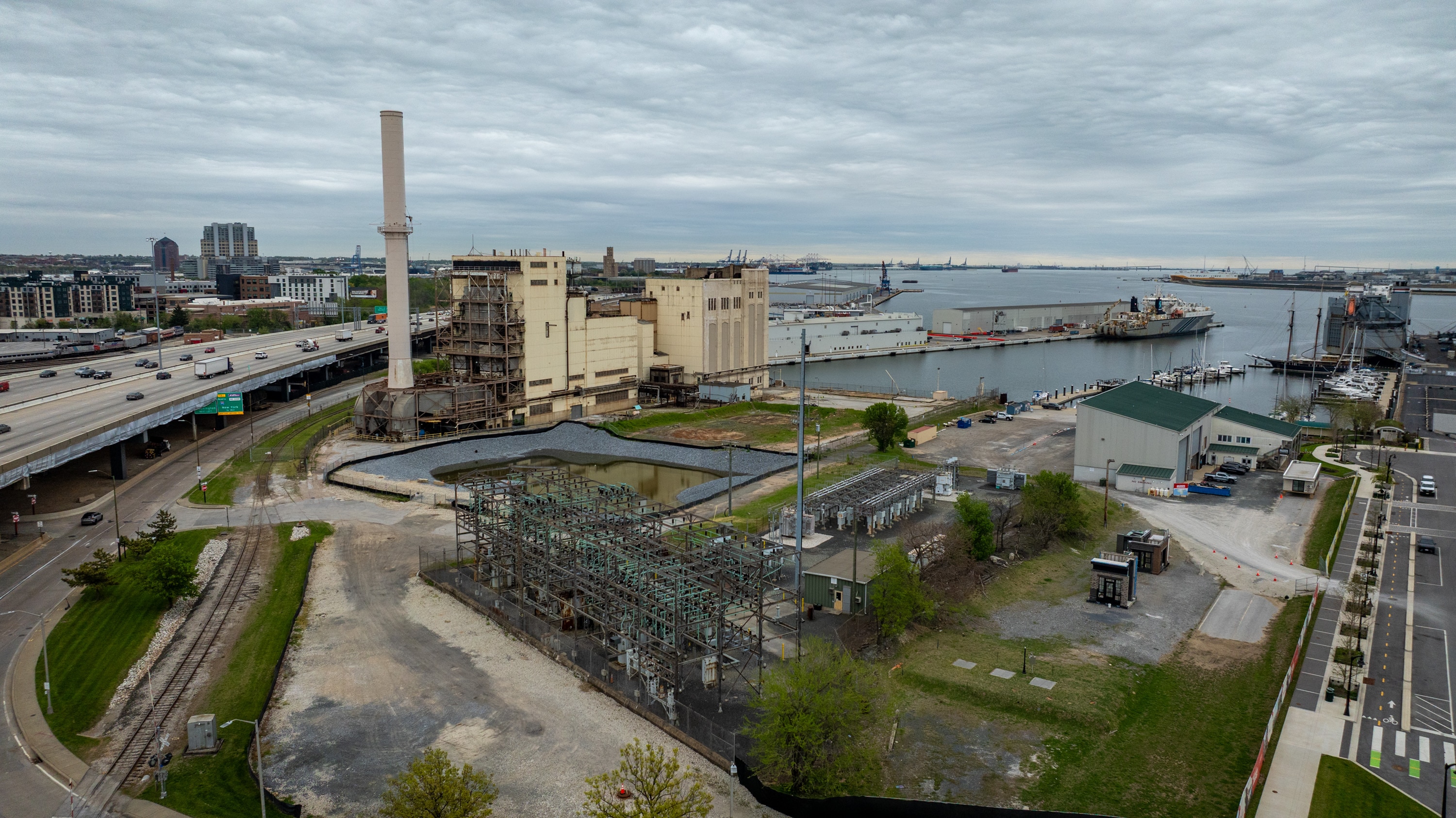 The Gould Street substation, foreground, sits in Baltimore Peninsula adjacent to the remaining structure of the former Gould Street Generating Station, which was taken offline in 2019.