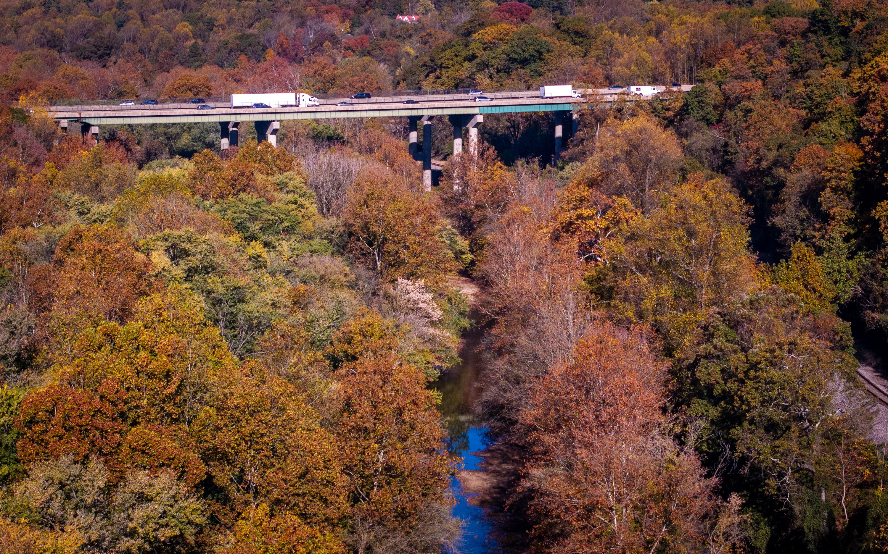 Police say a Baltimore man who allegedly shot and wounded a co-worker on Interstate 95 in Howard County may have blamed the victim for a demotion.