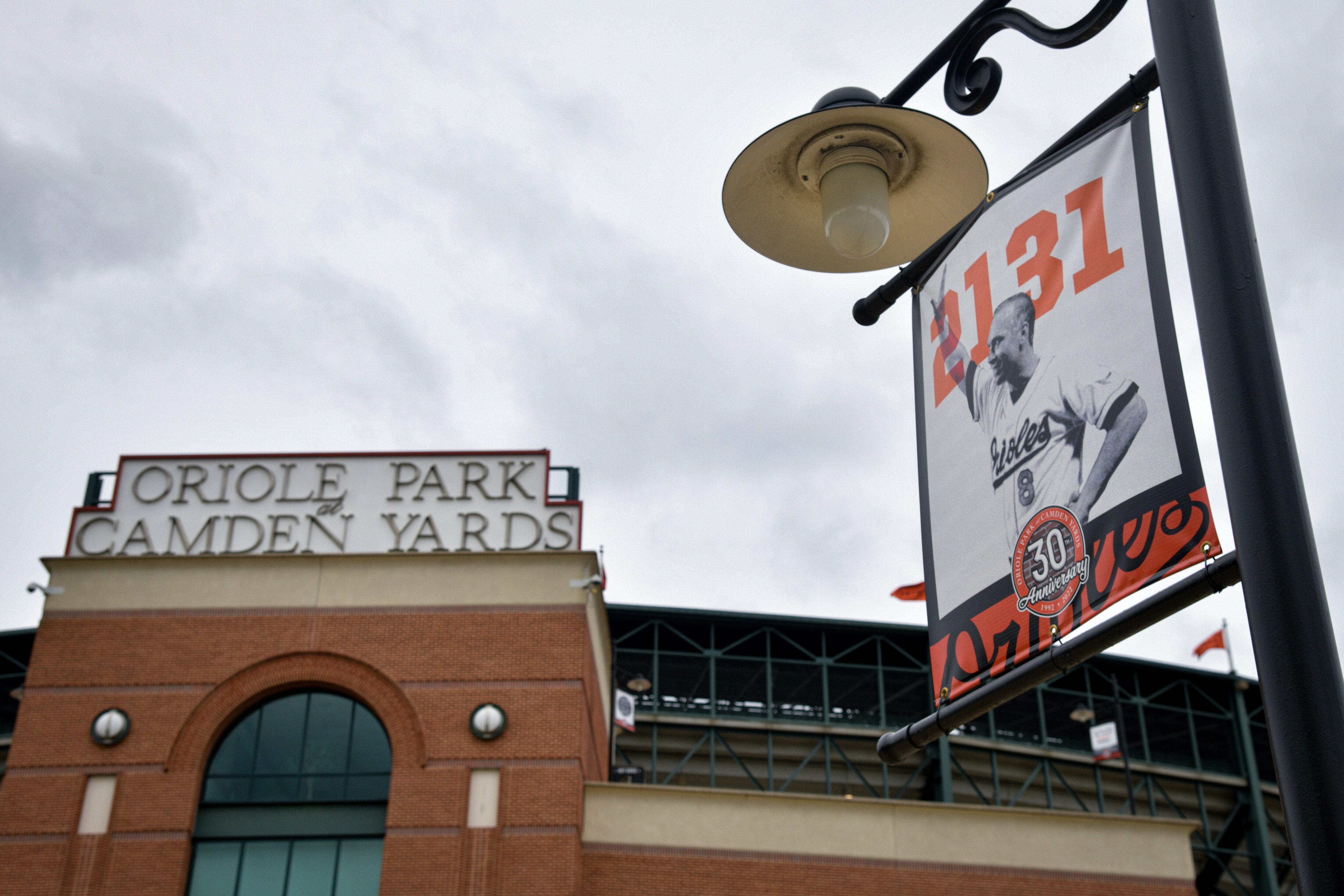 A poster of Cal Ripken hangs outside Oriole Park at Camden Yards, home of the Baltimore Orioles, in South Baltimore.