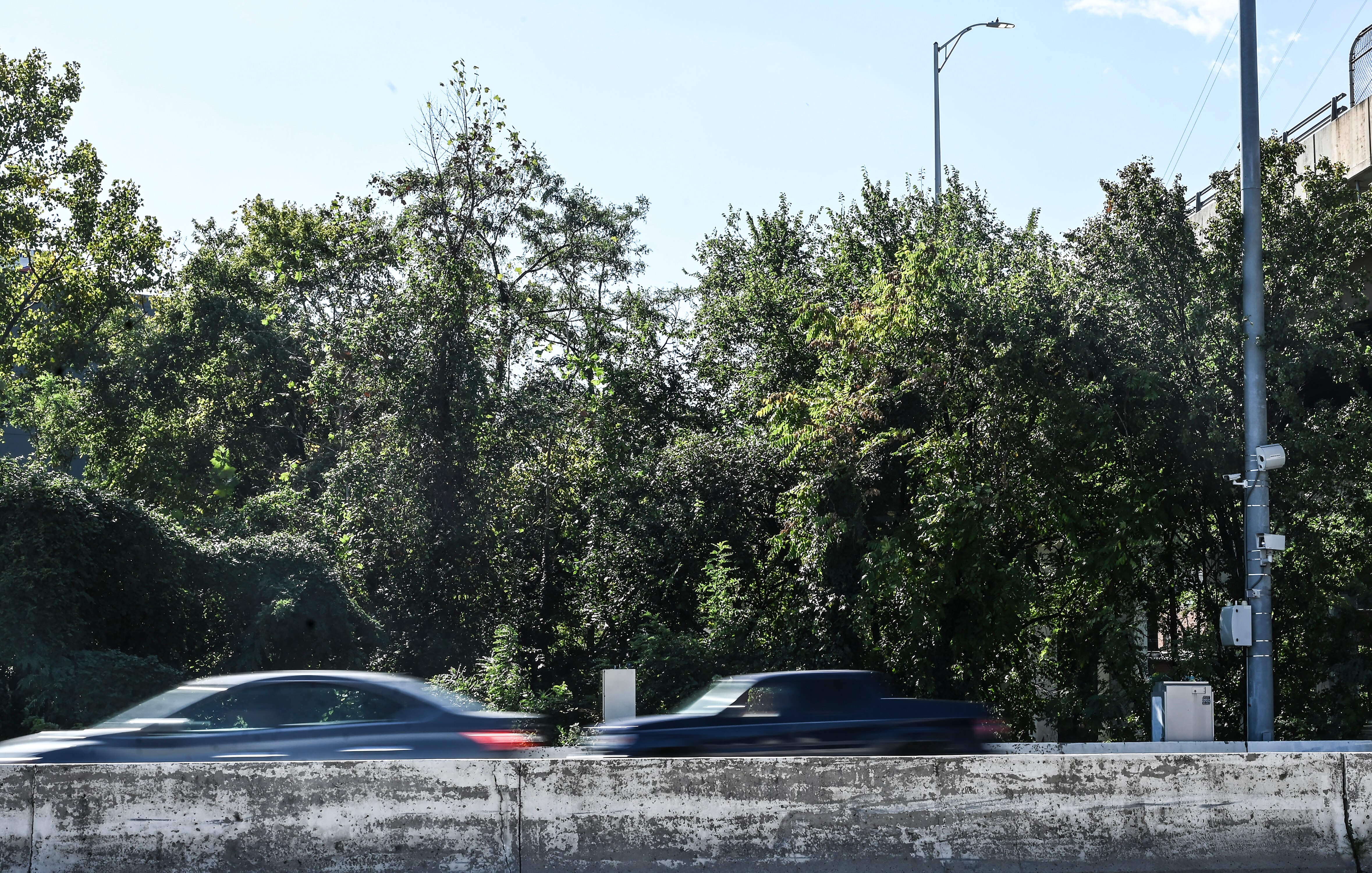 Weekend commuters zip past on of Baltimore City's speed camera on the Jones Falls Expressway on Sunday, October 1, 2023.