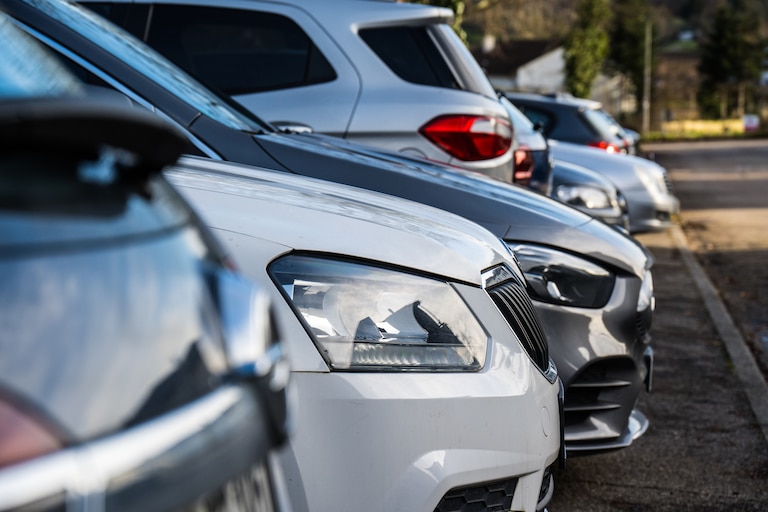 a row of parked cars