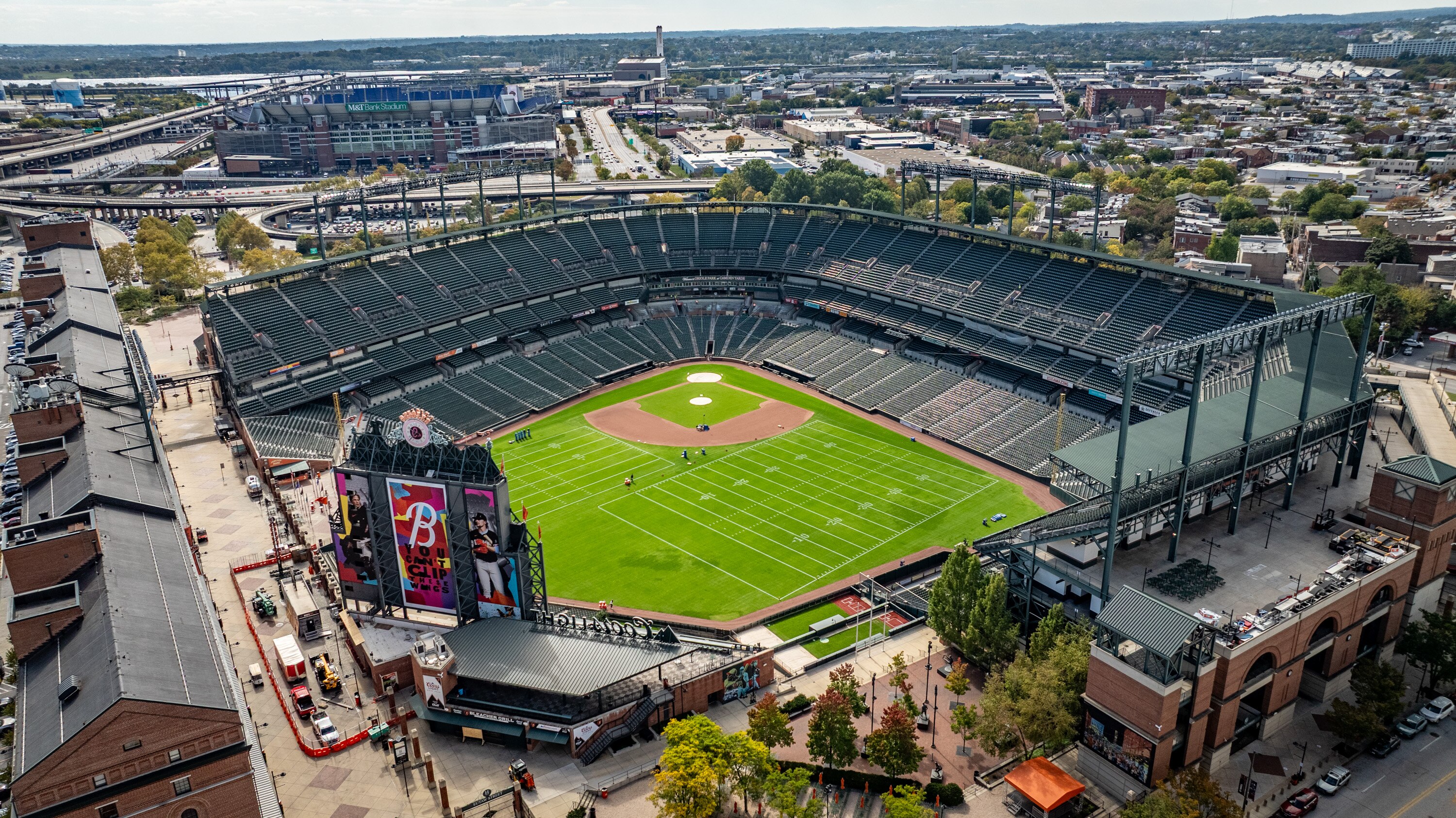 The outfield at Oriole Park has been transformed into a football practice field for the Los Angeles Rams as they prepare for a game this weekend in London.