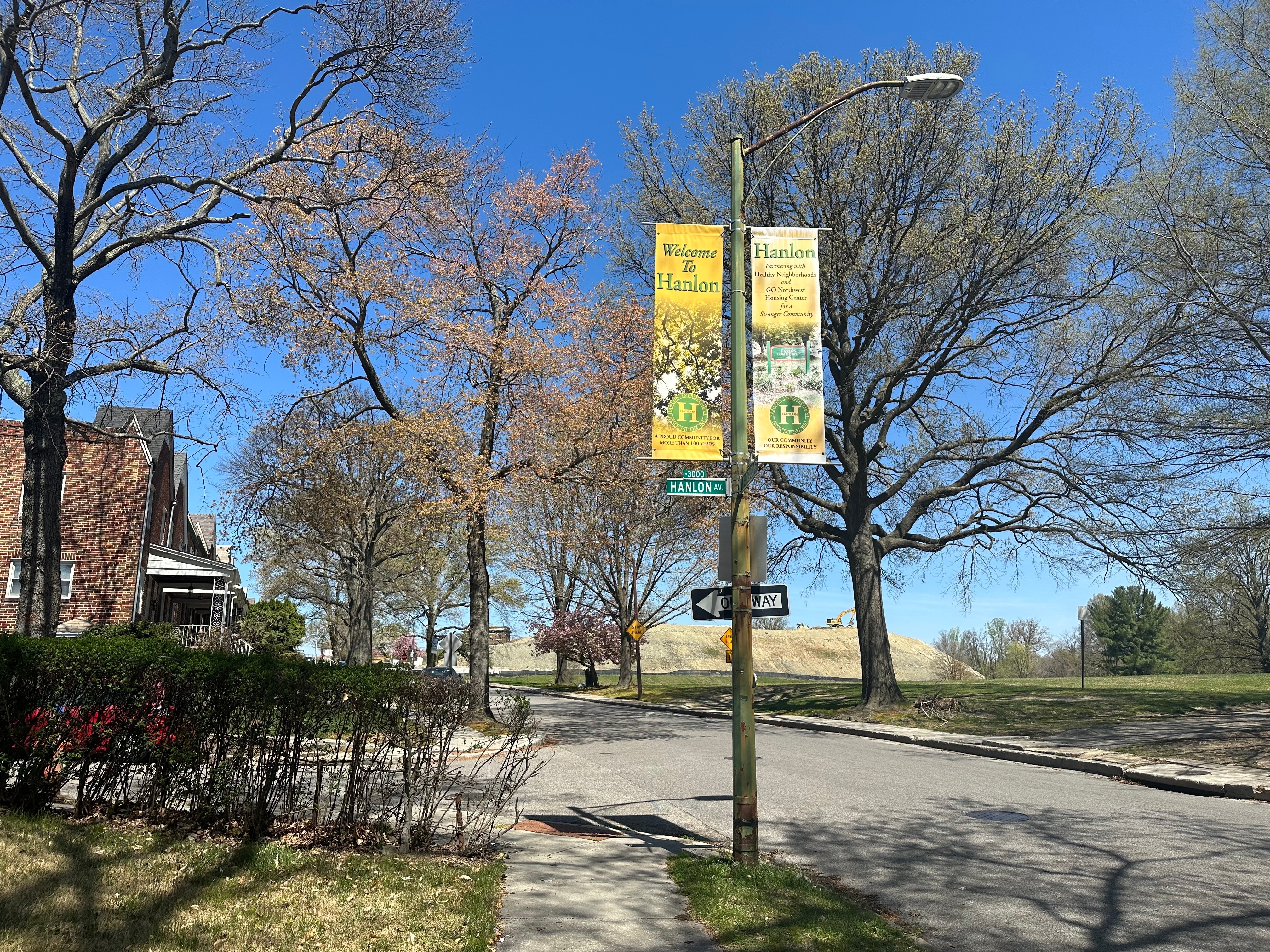 A banner reading “Welcome to Hanlon” on Hanlon Street.