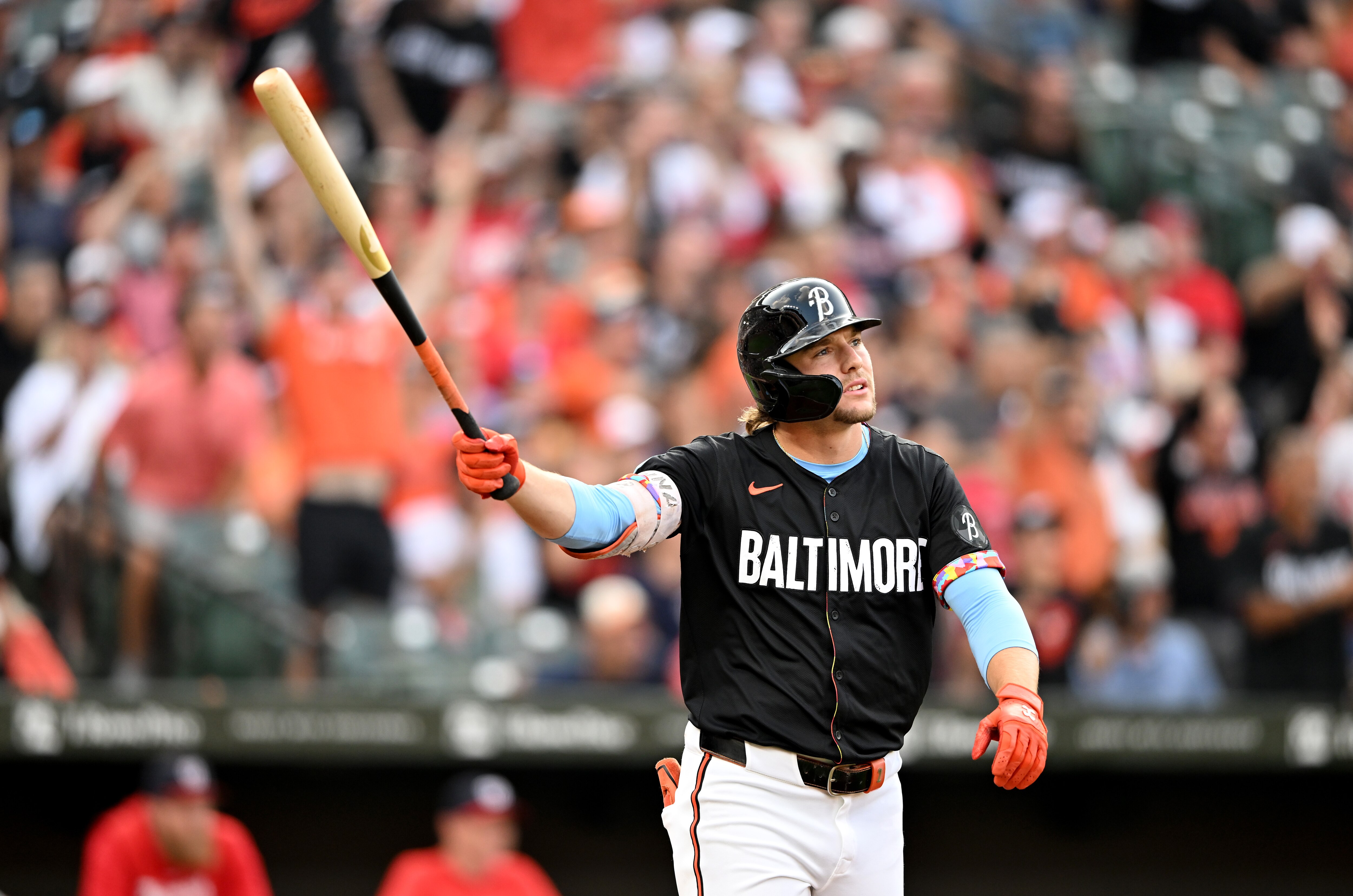 Gunnar Henderson watches his two-run home run clear the fence in the first inning Wednesday night at Camden Yards.
