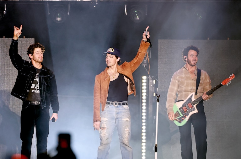 Nick Jonas, Joe Jonas and Kevin Jonas of The Jonas Brothers perform onstage during AT&T Playoff Playlist Live at Banc of California Stadium.