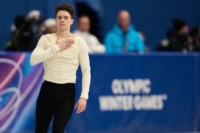 Maxim Naumov of the United States competes during the men's figure skating short program at the 2026 Winter Olympics, in Milan, Italy, Tuesday, Feb. 10, 2026. (AP Photo/Ashley Landis)